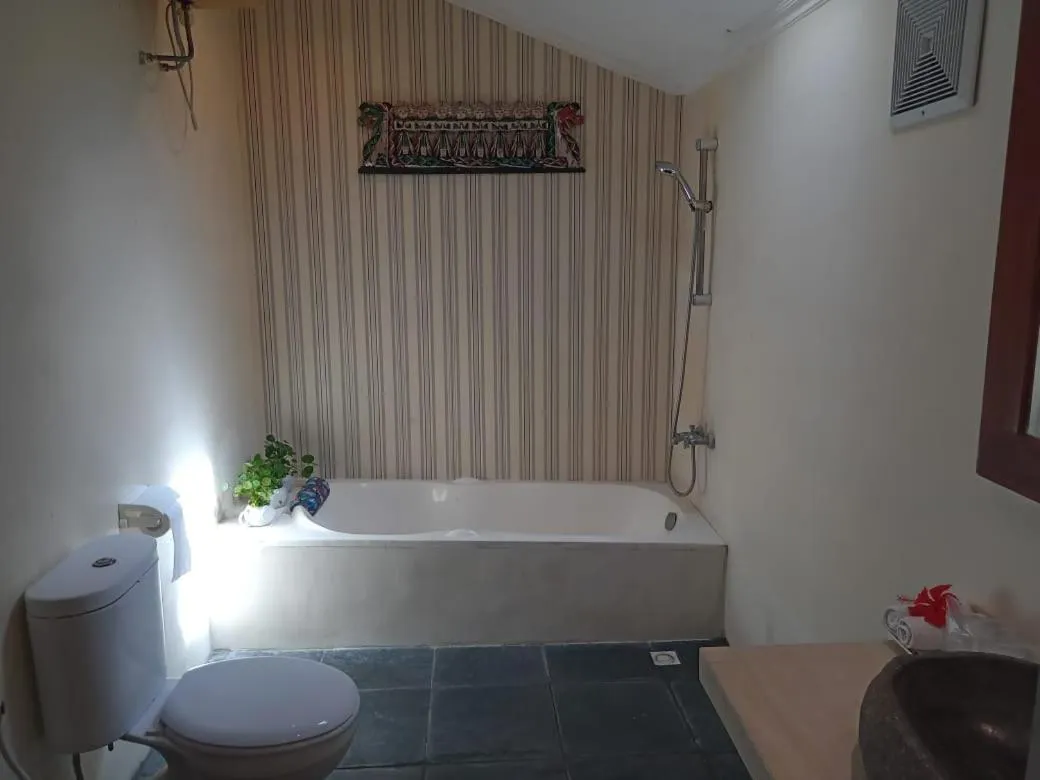 Bathroom in Rosella Cottages - Homestay - Yogyakarta