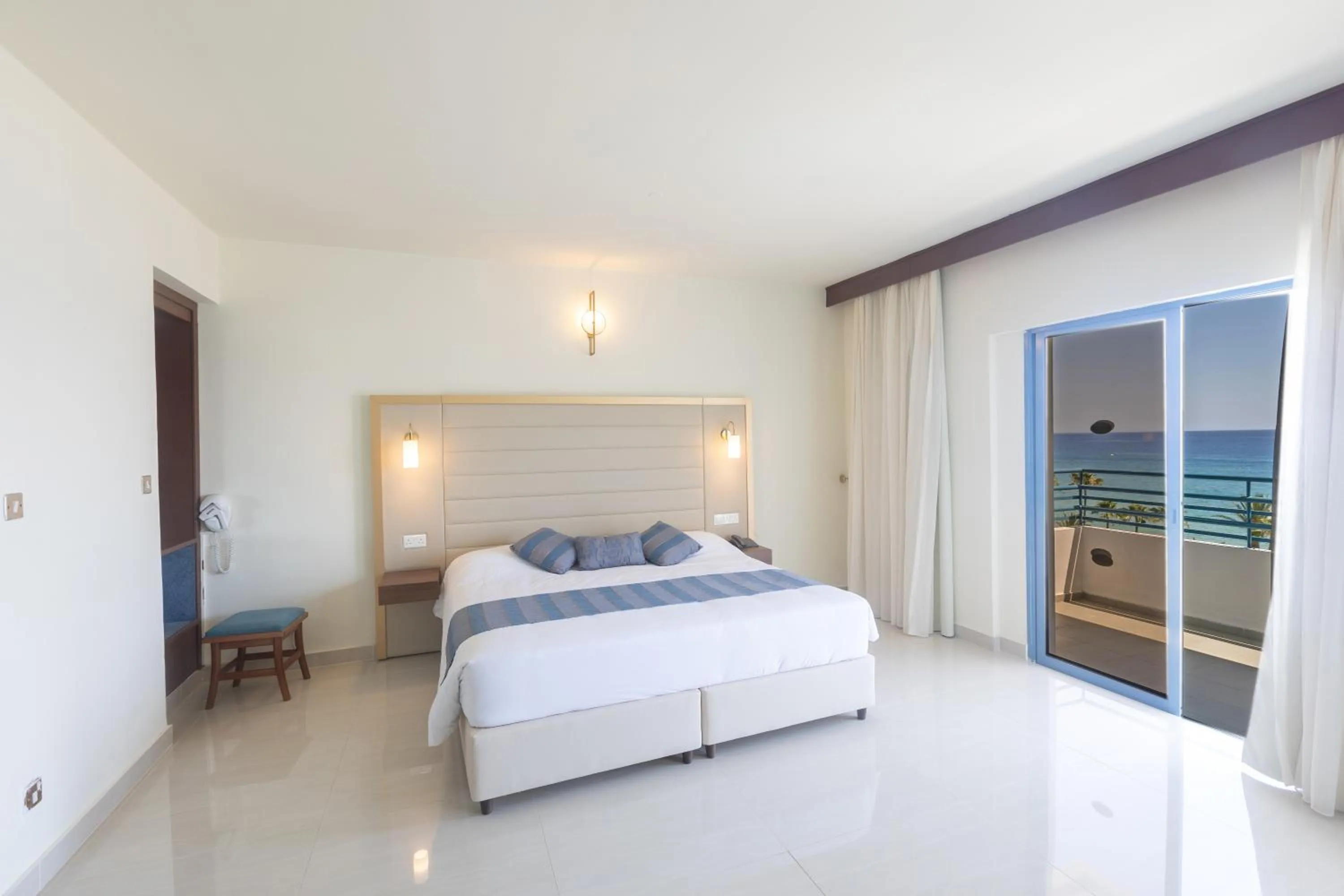 Bed in Iliada Beach Hotel