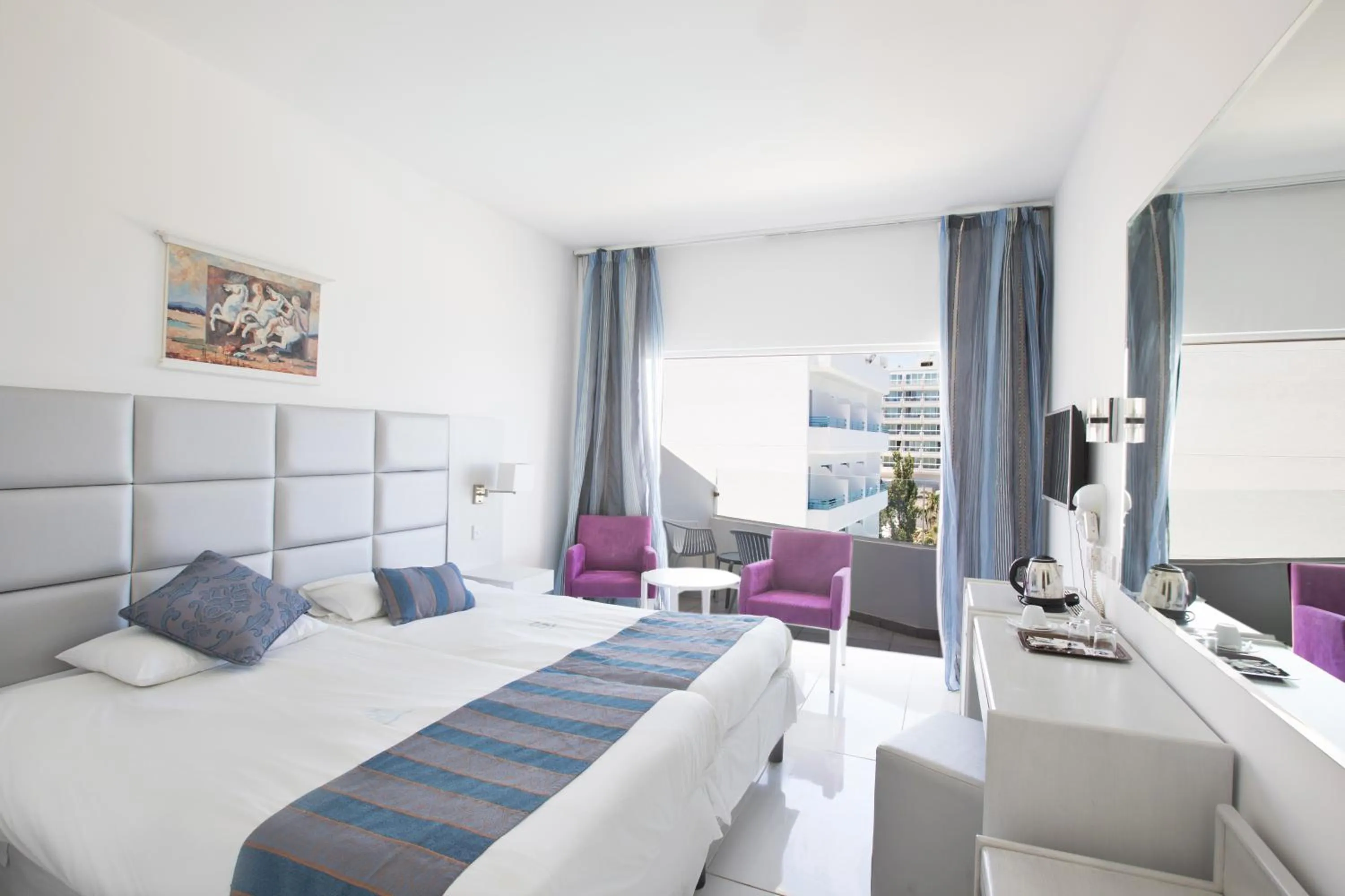 Bed in Silver Sands Beach Hotel