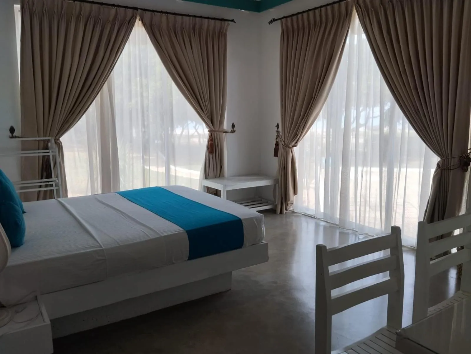 Bed in The Beach house by Kay Jay Hotels