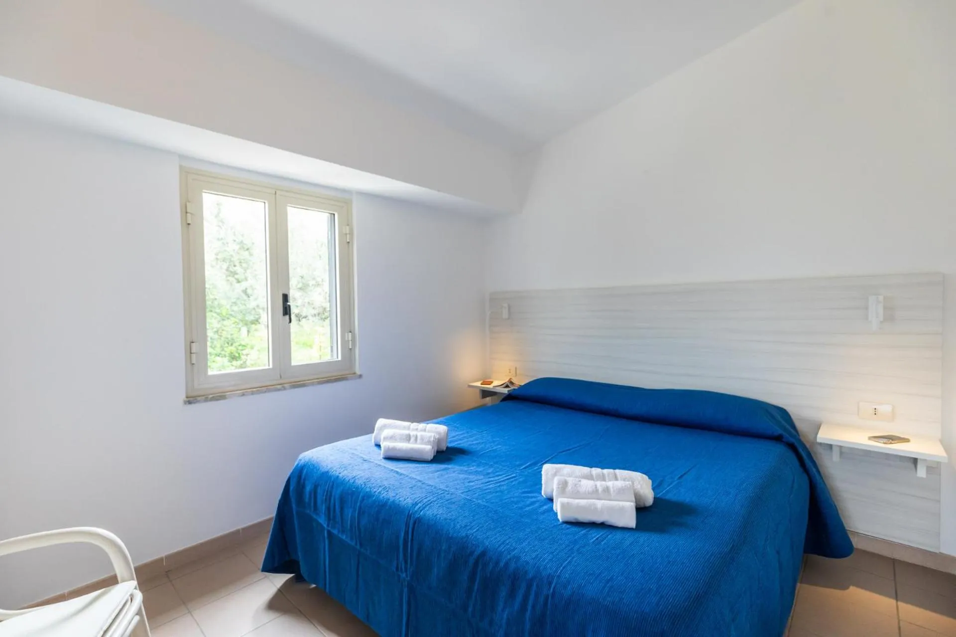 Photo of the whole room, Bed in La Meridiana