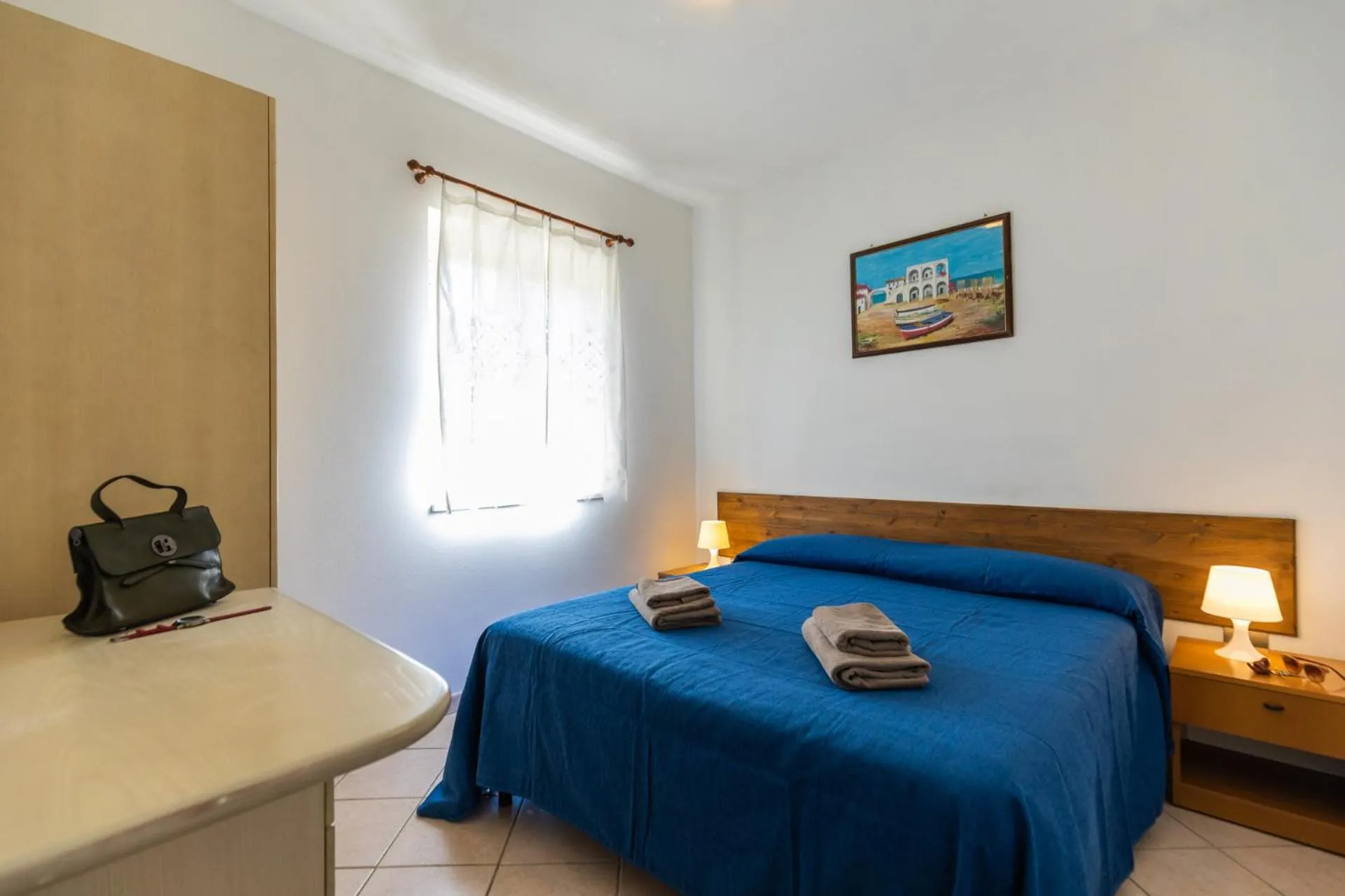 Photo of the whole room, Bed in La Meridiana