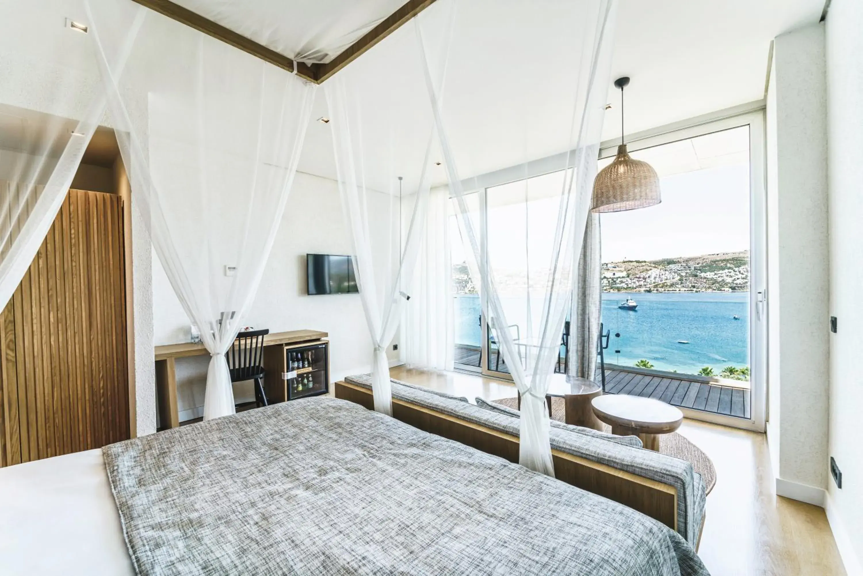 TV and multimedia, Bed in Cape Bodrum Luxury Hotel & Beach TV and multimedia, Bed in Cape Bodrum Luxury Hotel & Beach