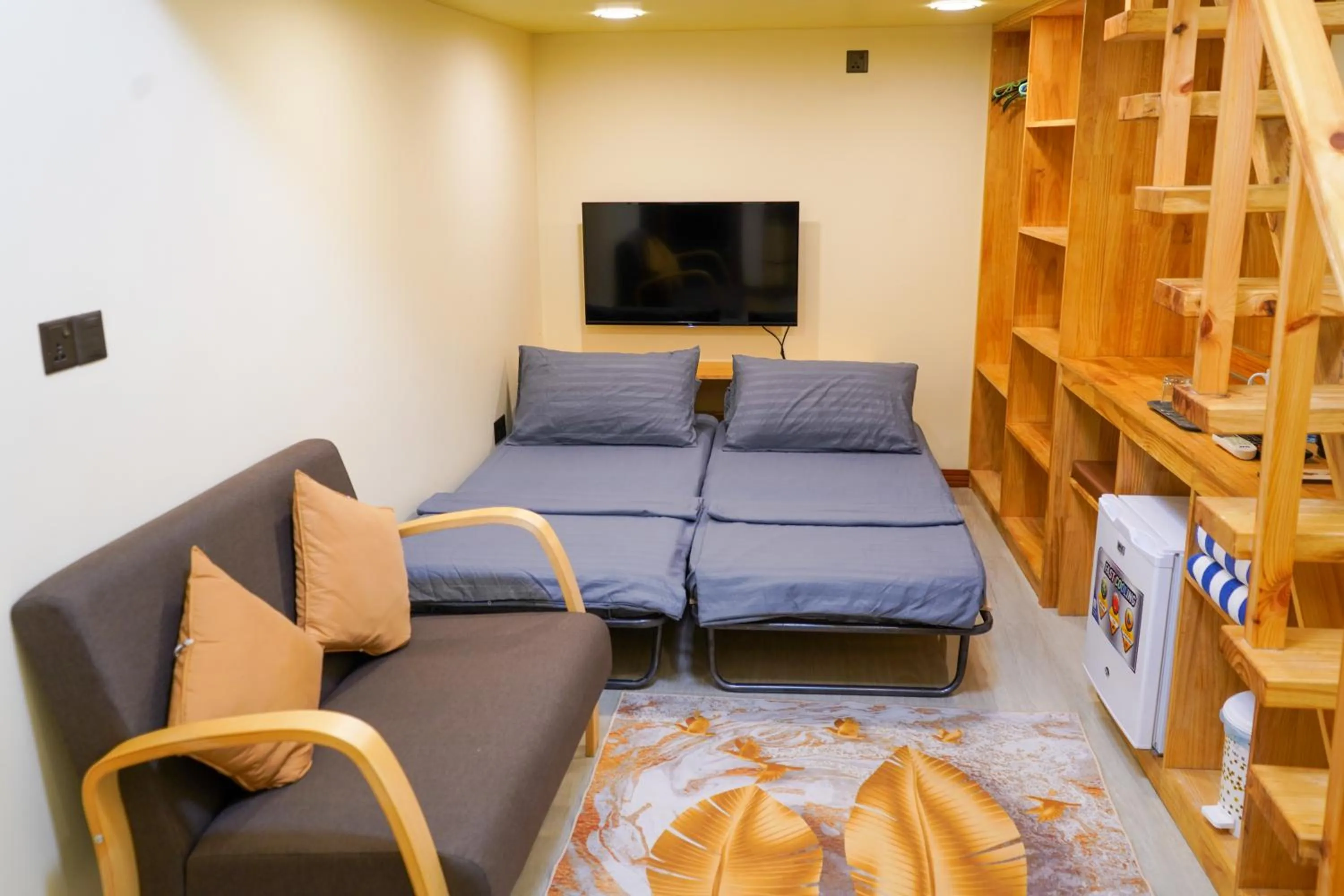 Communal lounge/ TV room in Banyan Villa Maldives Dhangethi