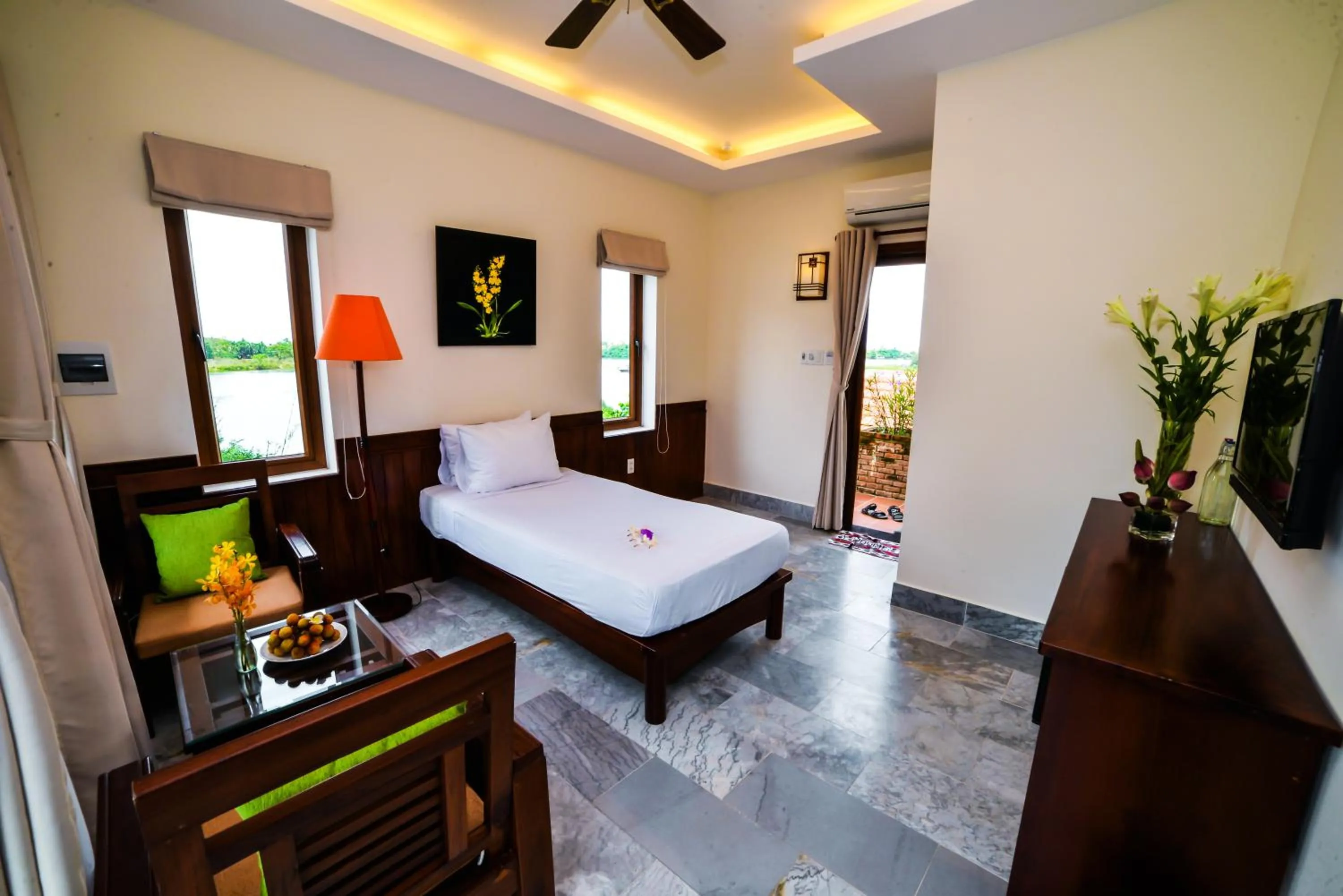 Dining area, Bed in Villa Orchid Garden Riverside Hoi An