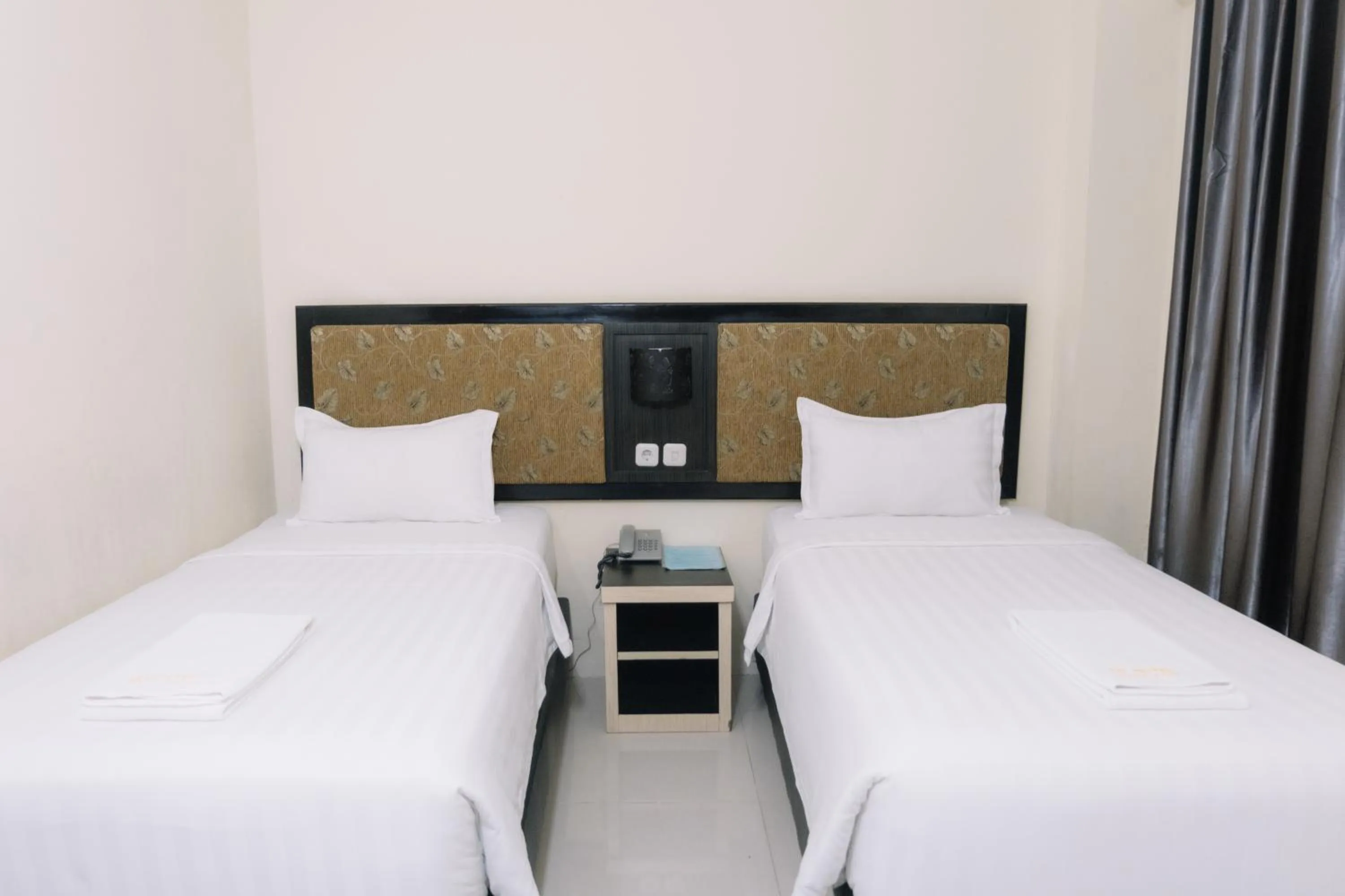 Bed in Sei Hotel Aceh