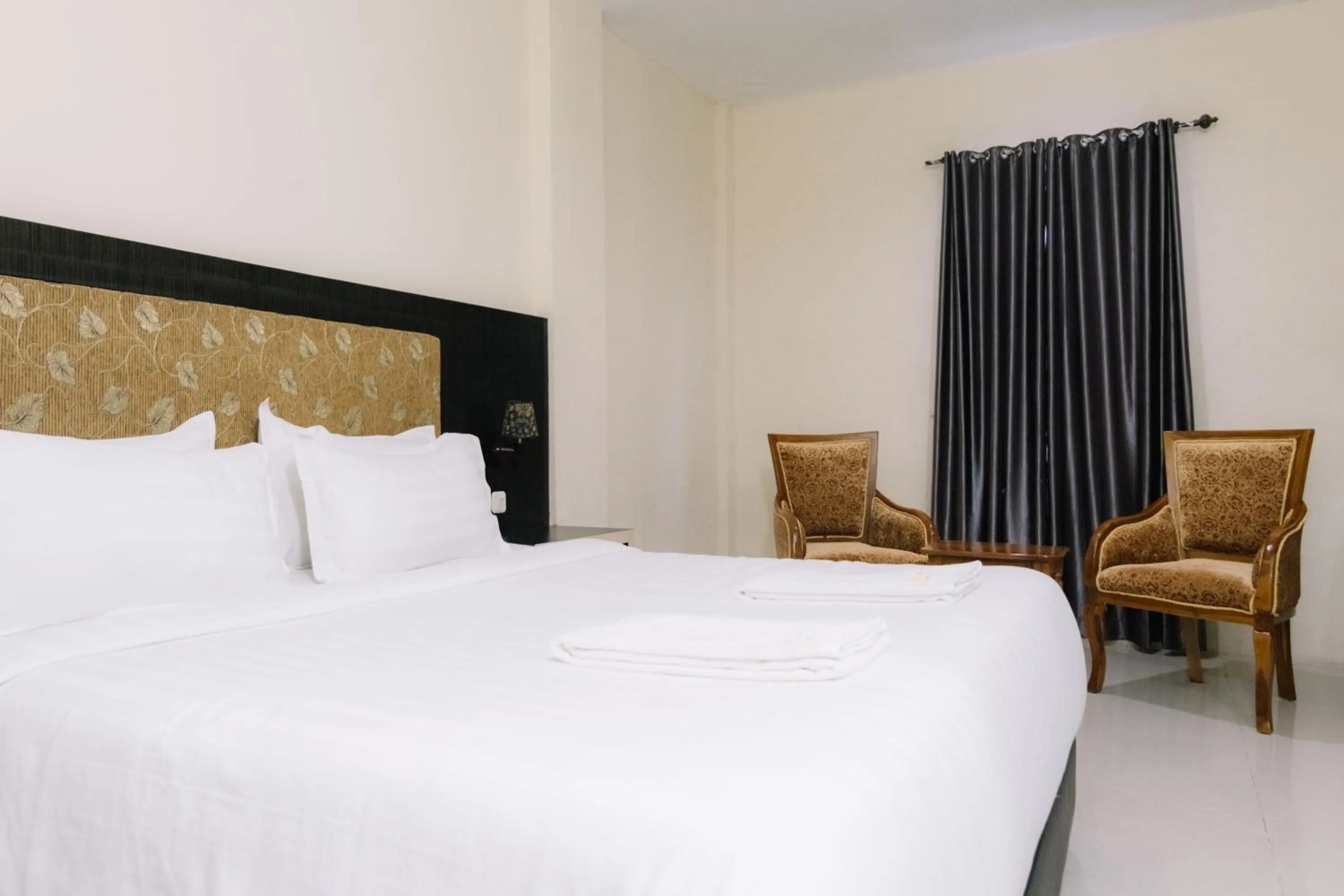 Bed in Sei Hotel Aceh