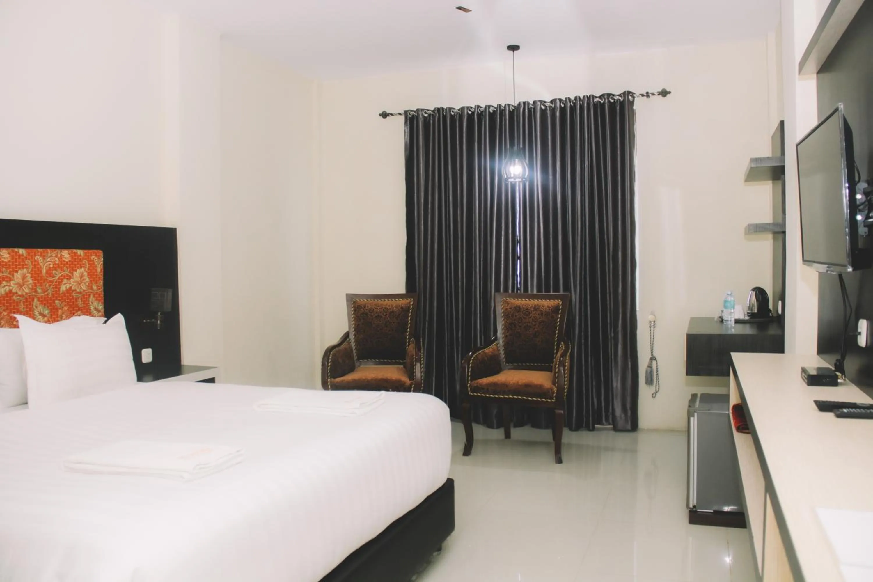 Bed in Sei Hotel Aceh