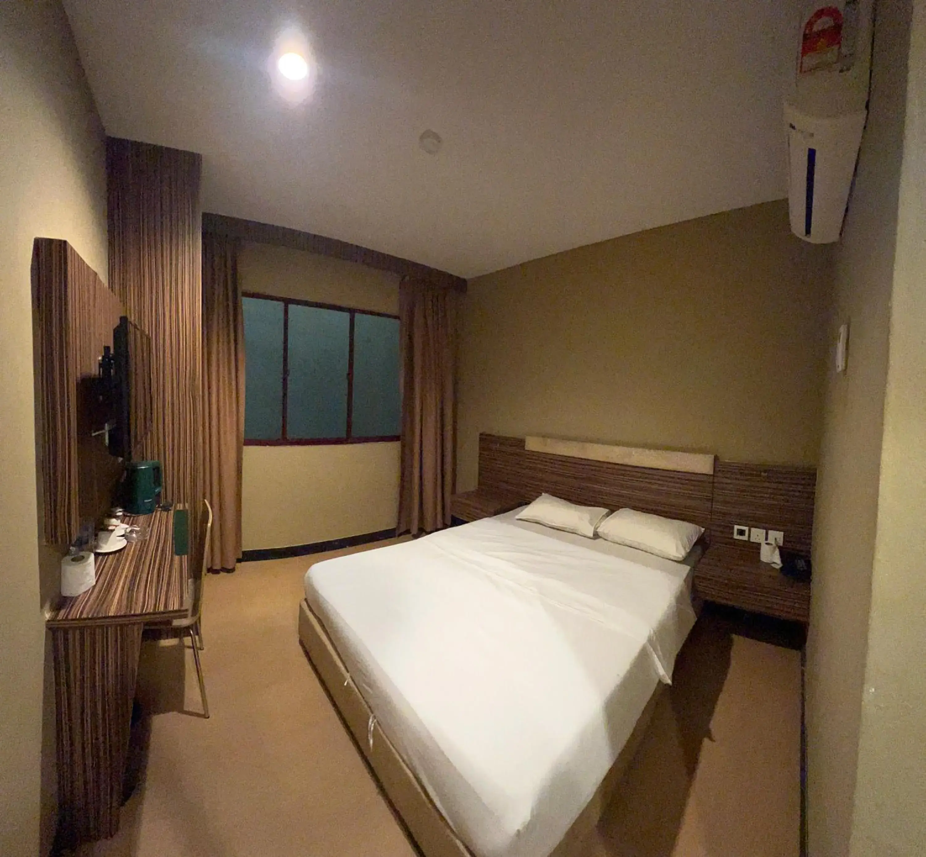 Bedroom, Bed in Havona Hotel - Permas Jaya - Self Check-In Bedroom, Bed in Havona Hotel - Permas Jaya - Self Check-In
