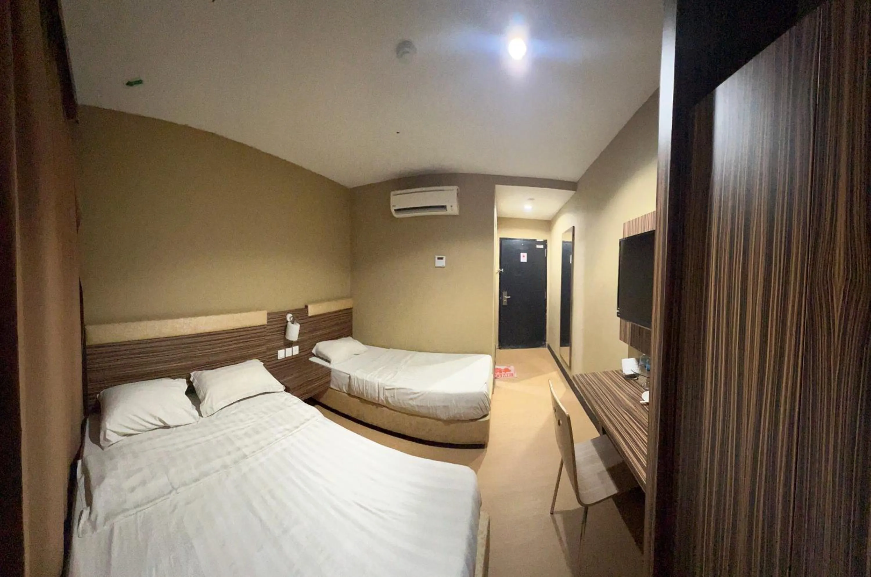 Bedroom, Bed in Havona Hotel - Permas Jaya - Self Check-In