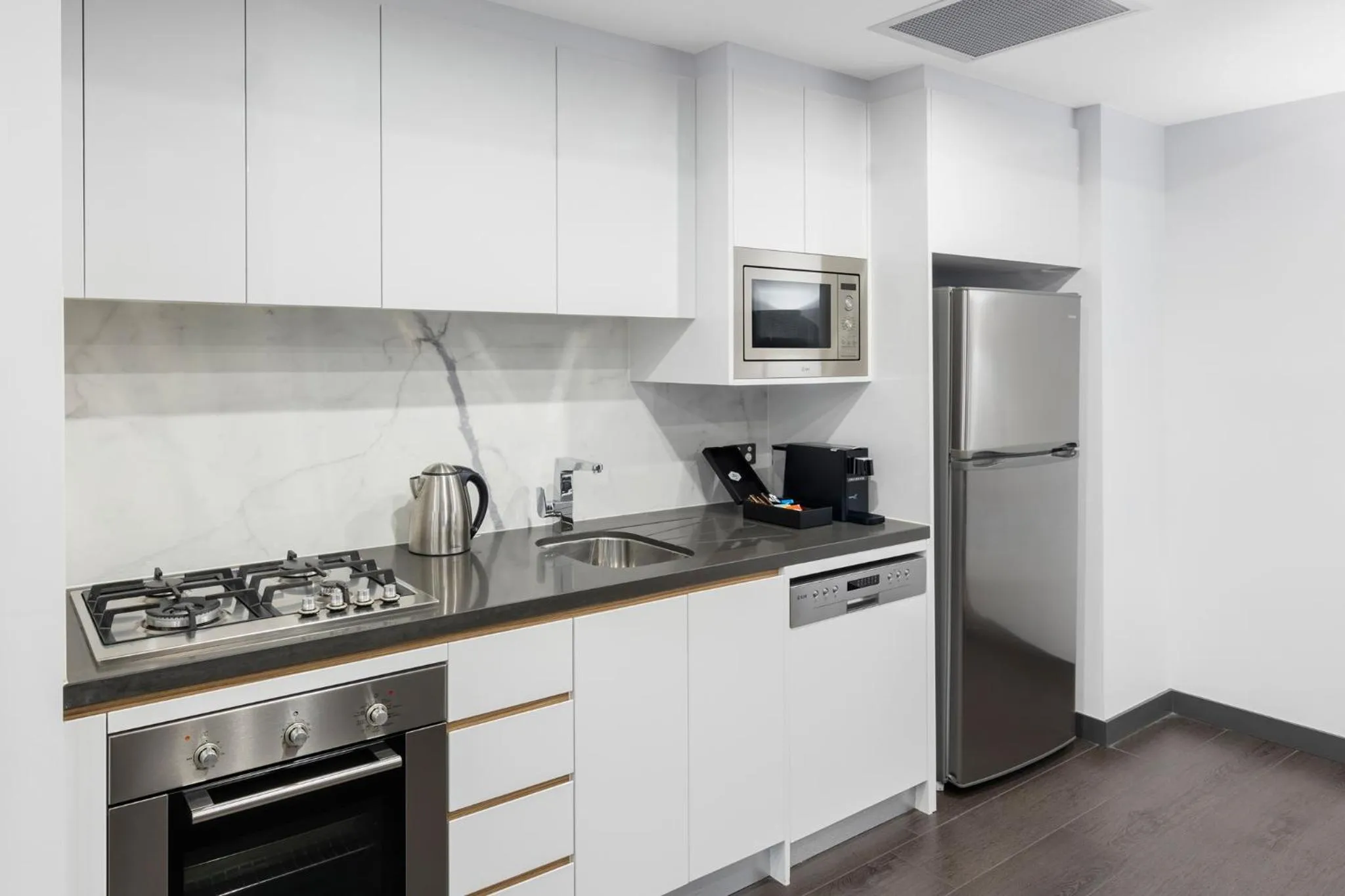 kitchen in Meriton Suites Chatswood