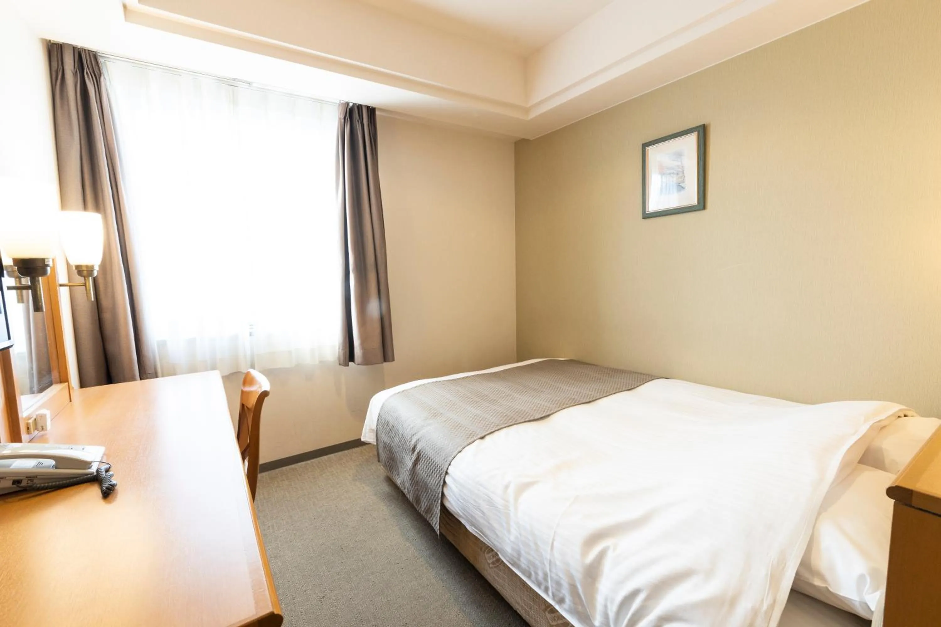 Bed in Imabari Urban Hotel