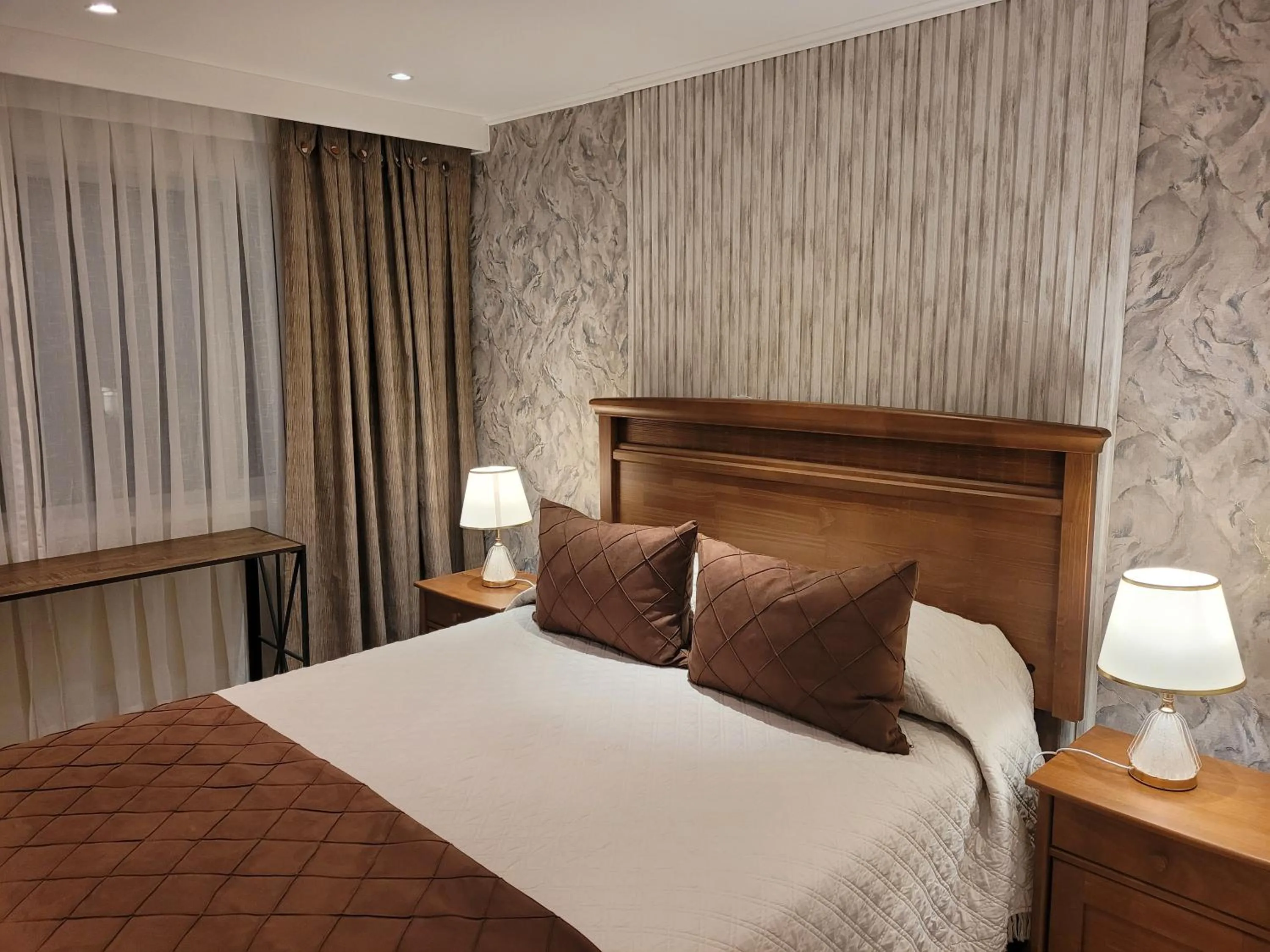 Bed in Hotel Puerta del Lago