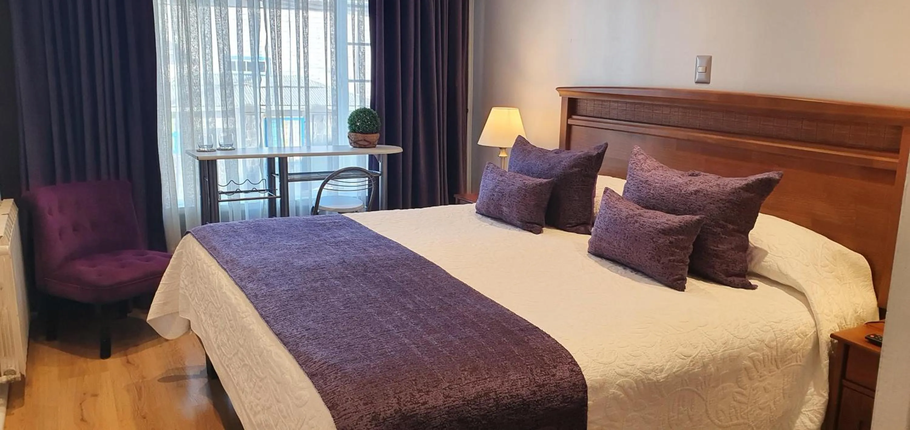 Bed in Hotel Puerta del Lago