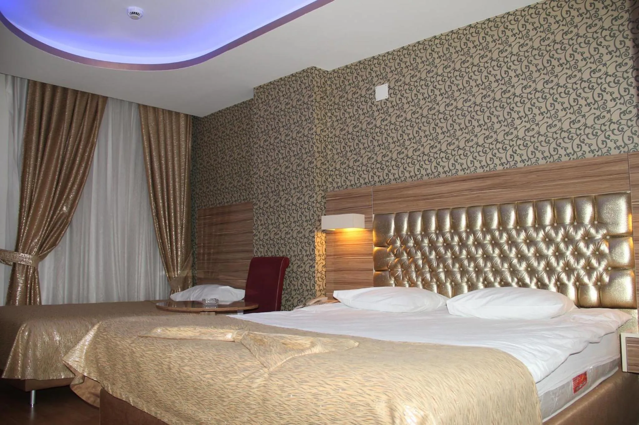 Bed in Grand Ezel Hotel