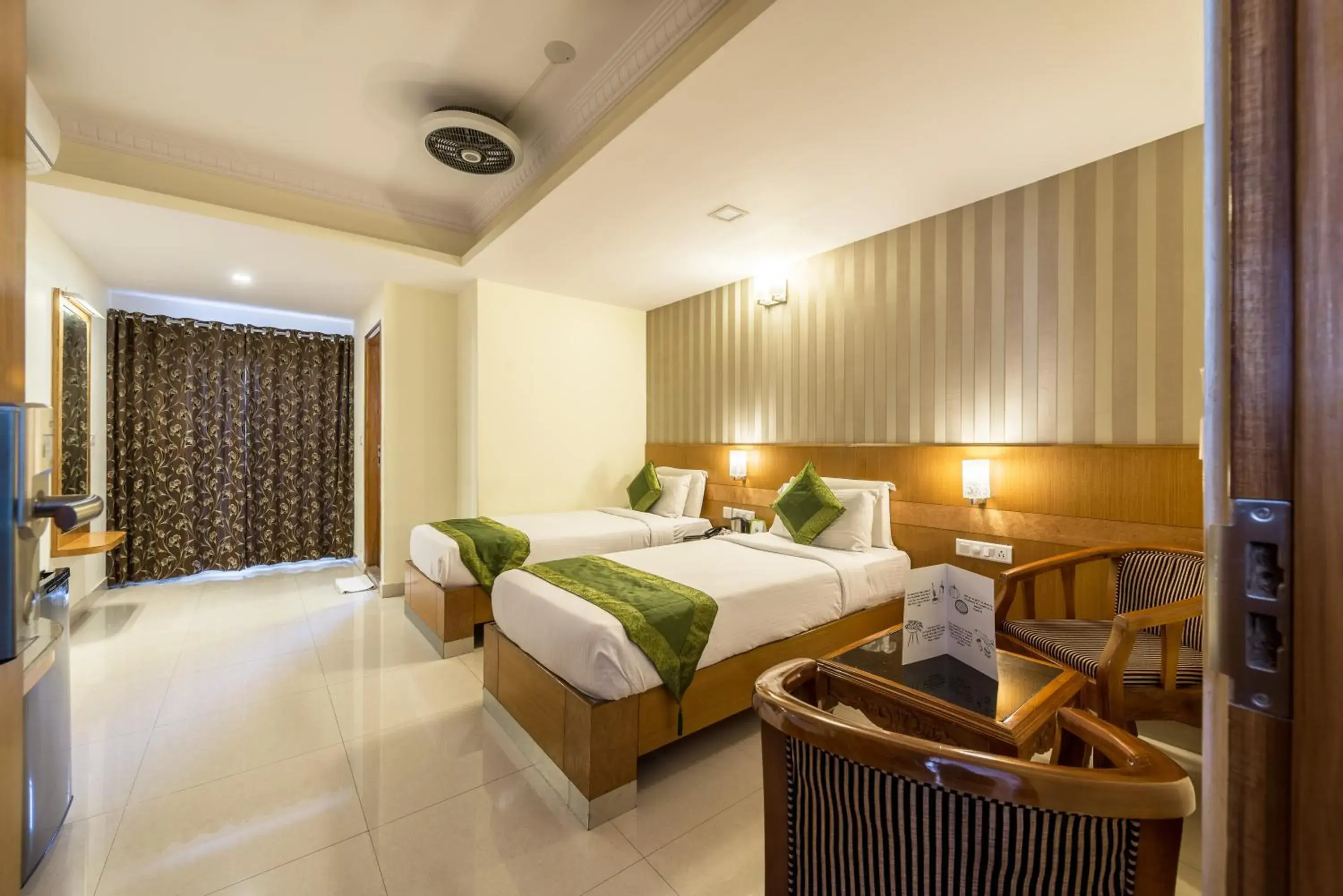 Bed in Treebo Akshaya Lalbagh Inn Bed in Treebo Akshaya Lalbagh Inn