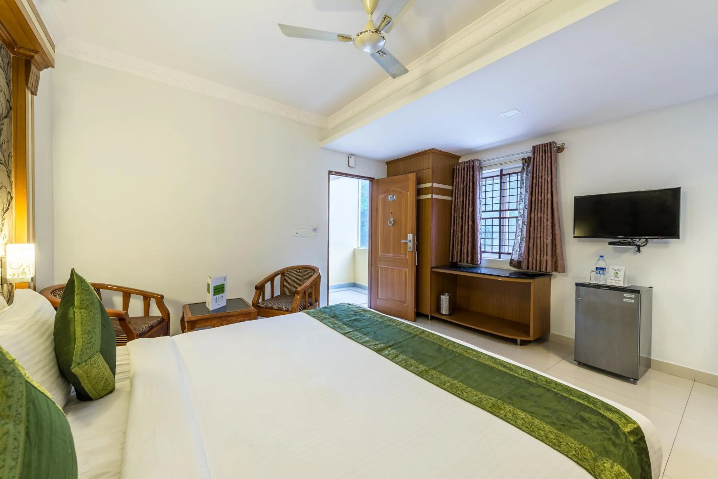 Bed in Treebo Akshaya Lalbagh Inn