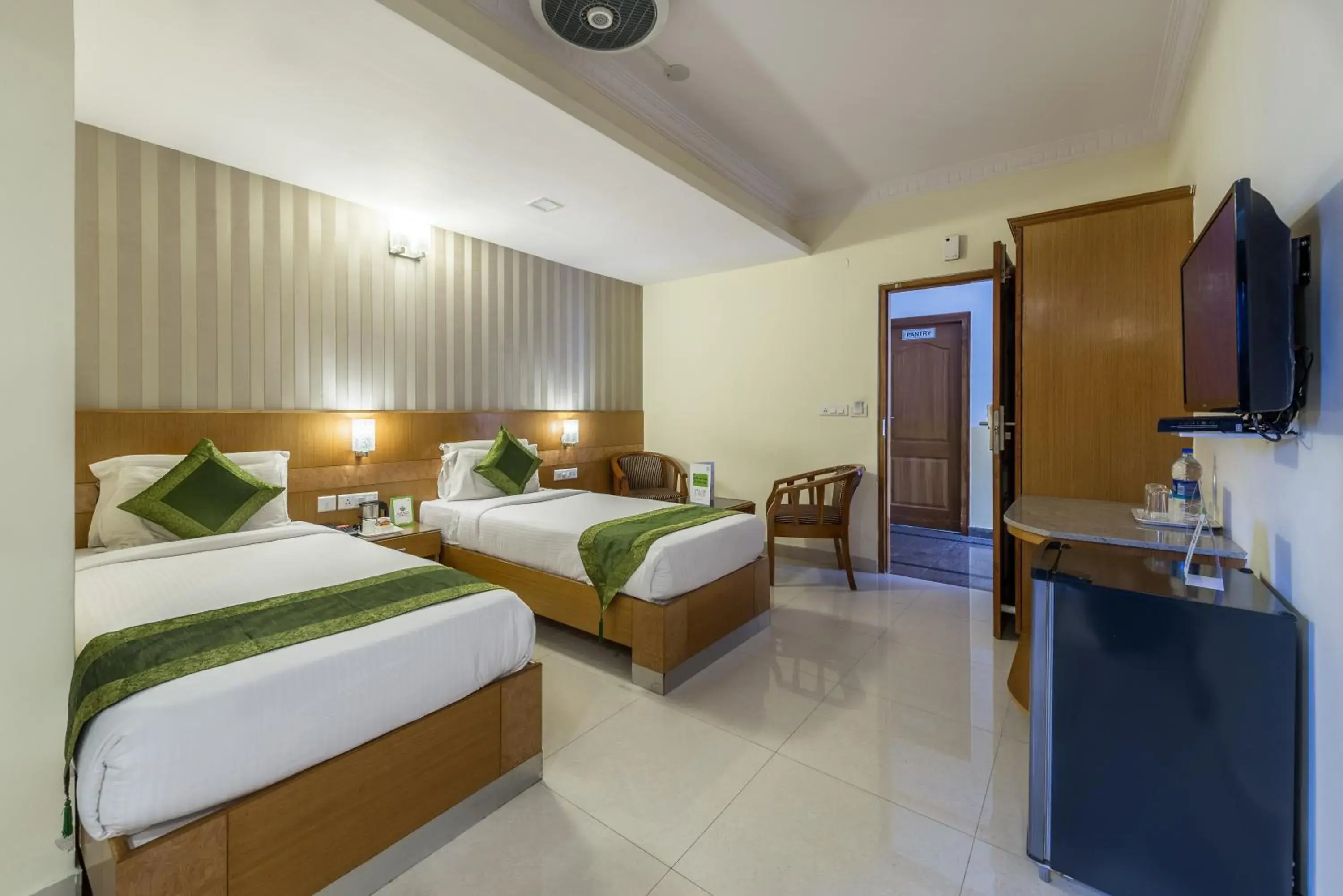 Bed in Treebo Akshaya Lalbagh Inn Bed in Treebo Akshaya Lalbagh Inn