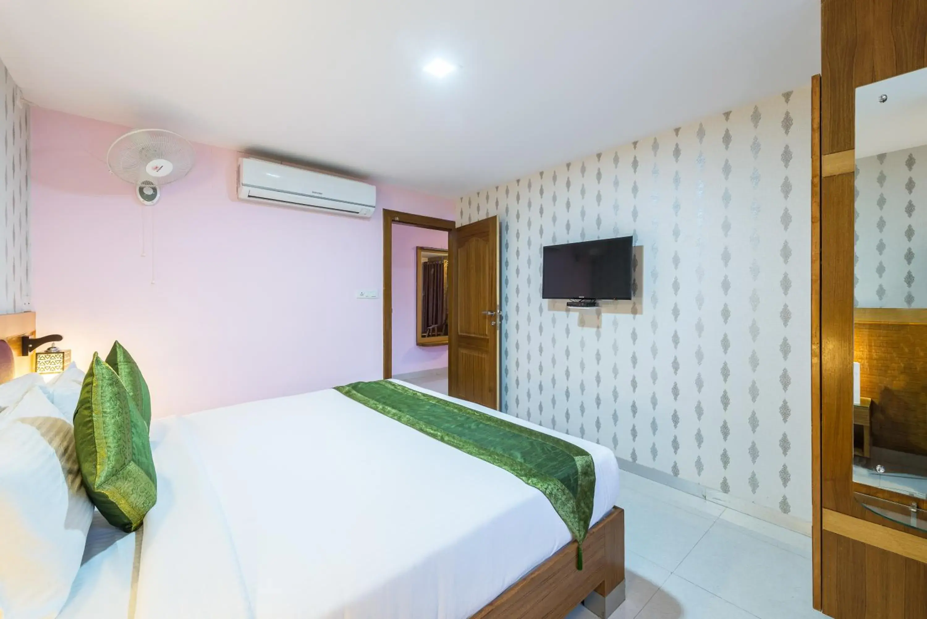 Bed in Treebo Akshaya Lalbagh Inn Bed in Treebo Akshaya Lalbagh Inn