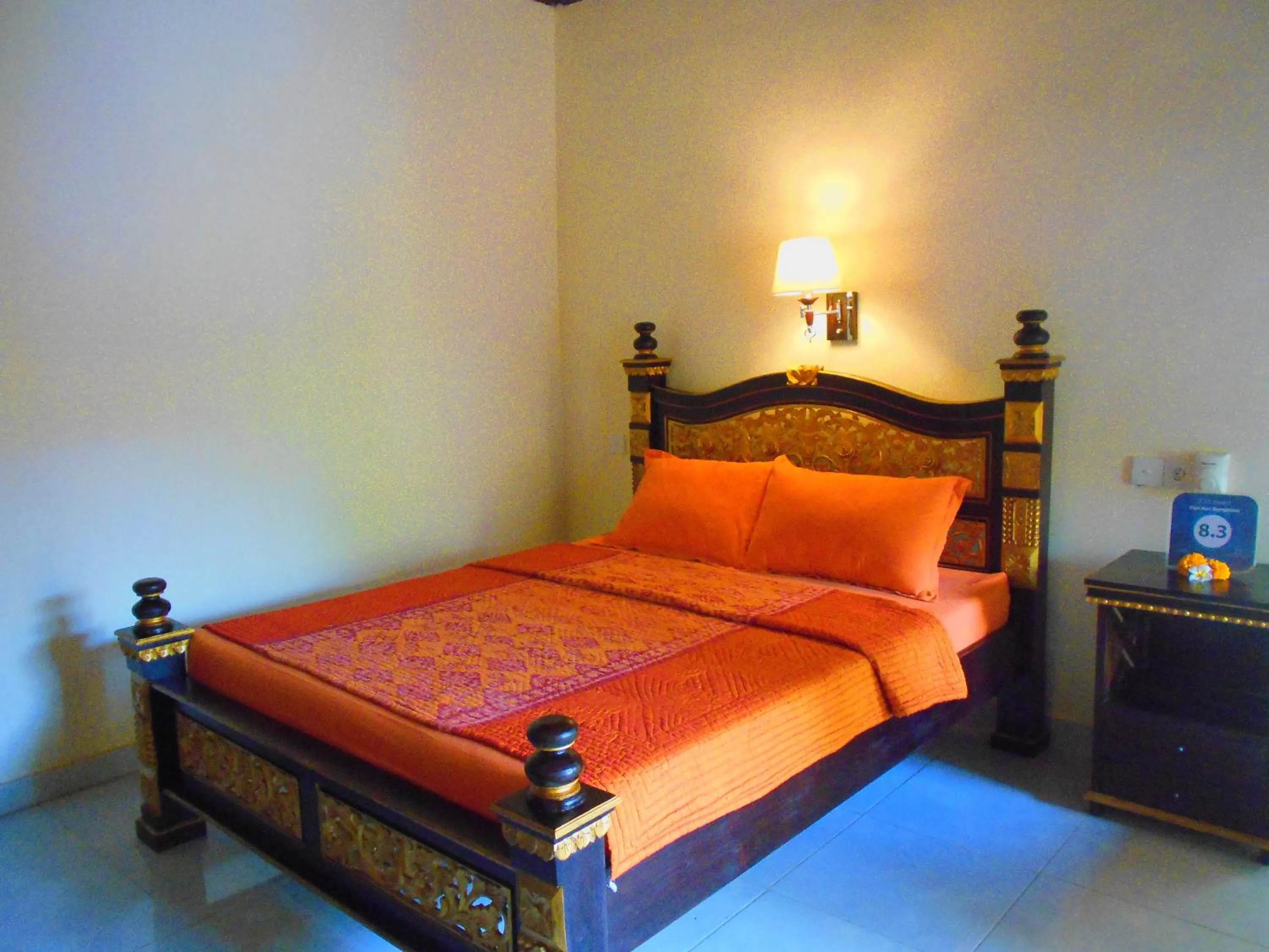 Bed in Puri Asri Bungalow Ubud