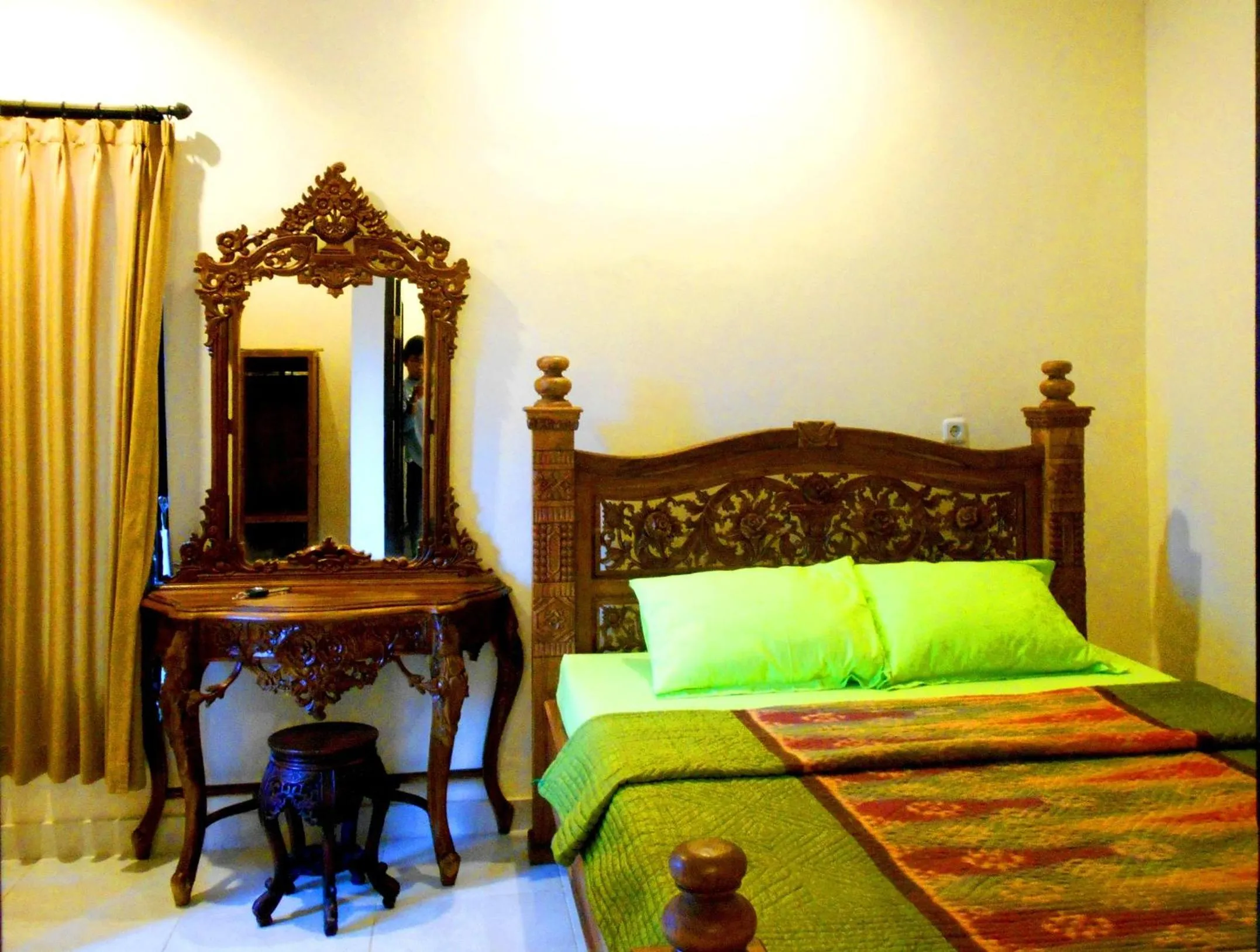 Bed in Puri Asri Bungalow Ubud