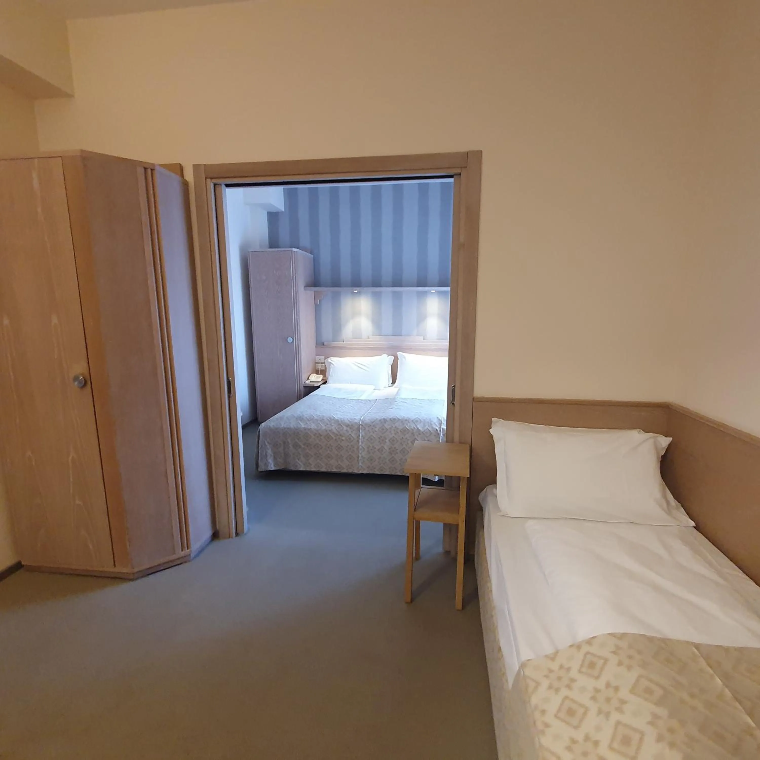 Photo of the whole room, Bed in Hotel Europa Lignano