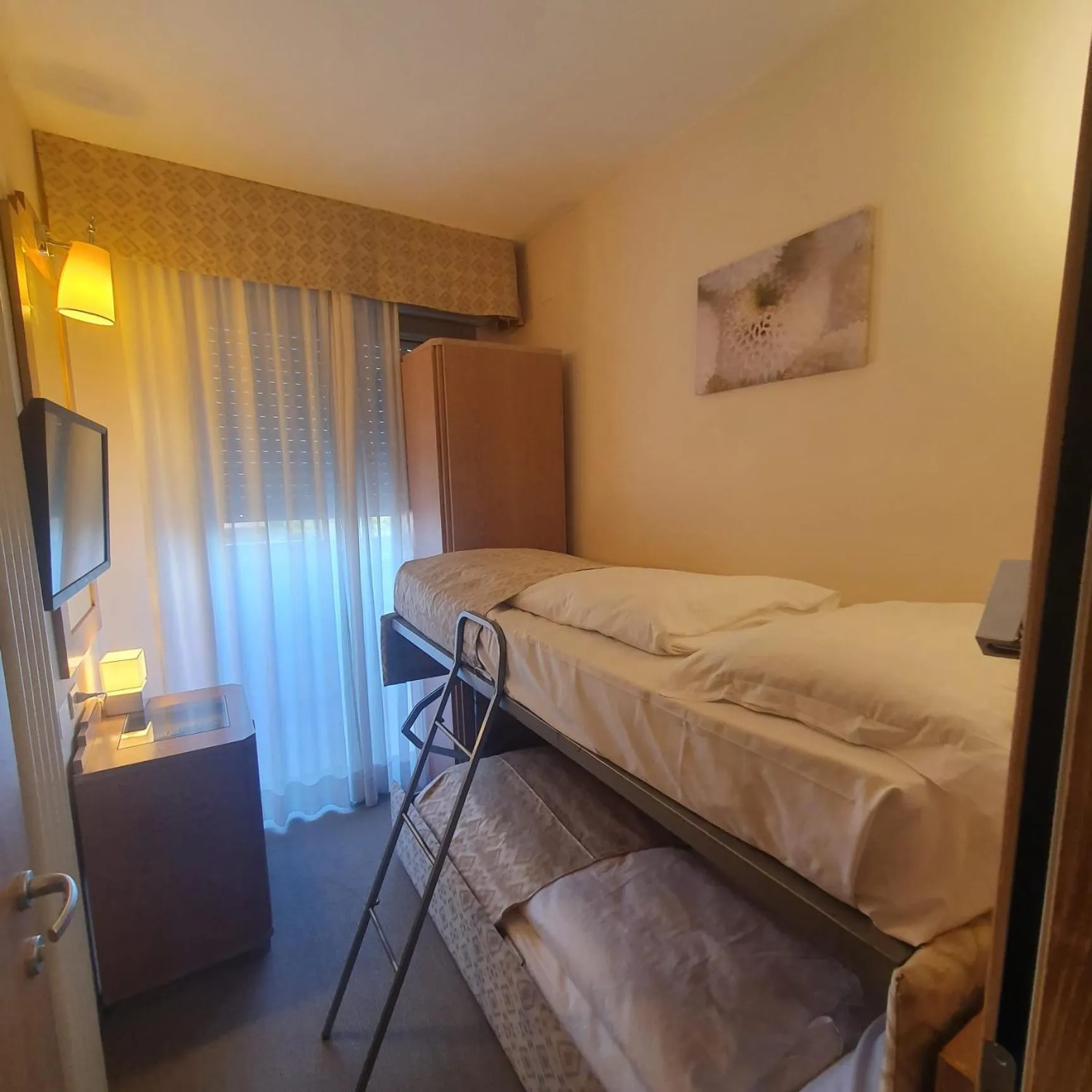 Bed in Hotel Europa Lignano