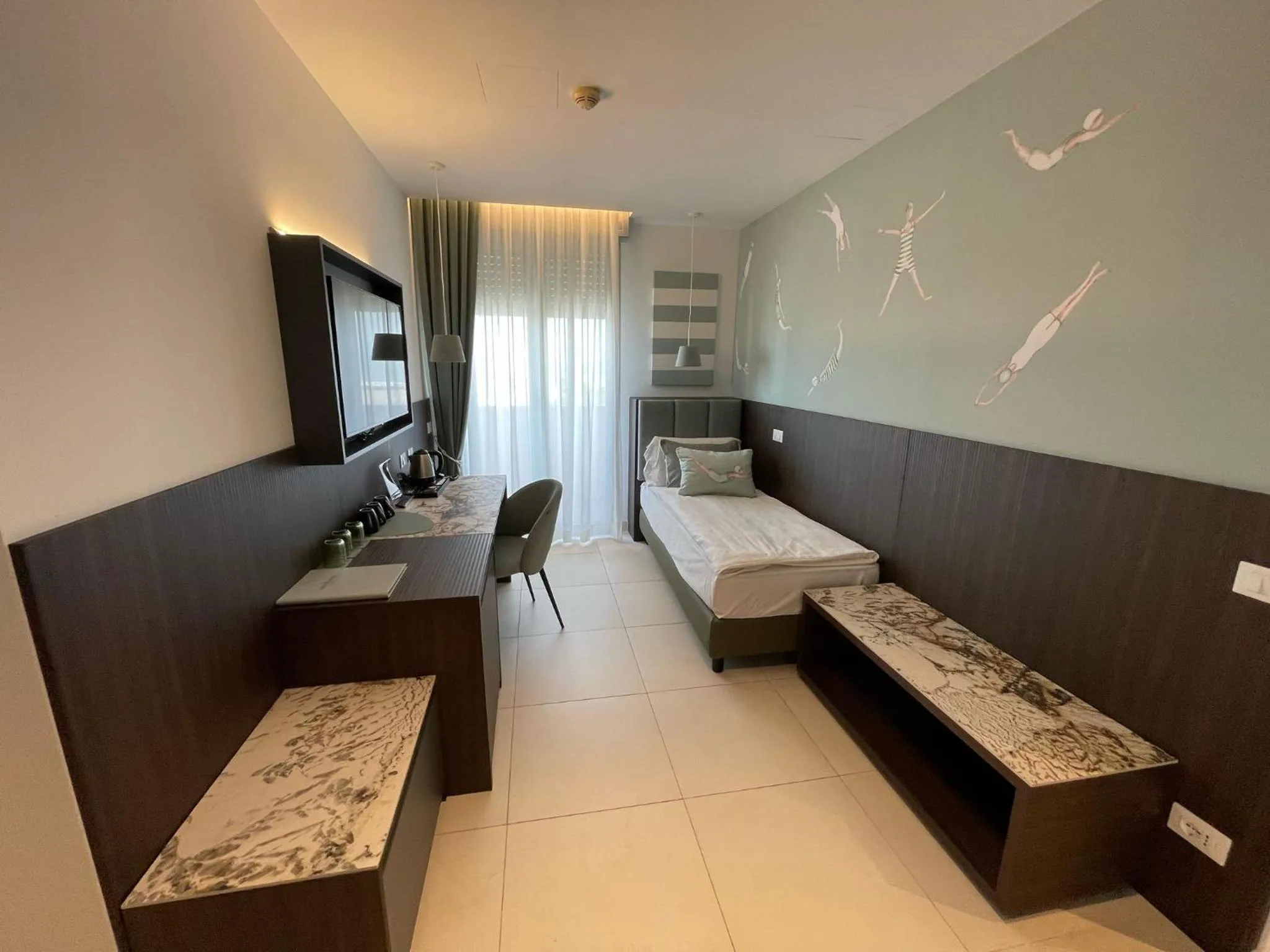 Photo of the whole room, Bed in Hotel Europa Lignano