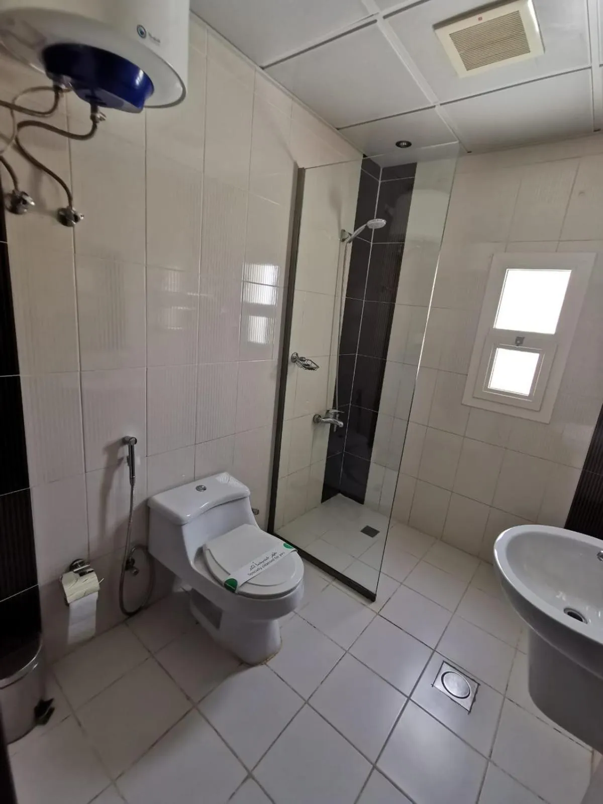 Toilet in Ashbonh Hotel Suites