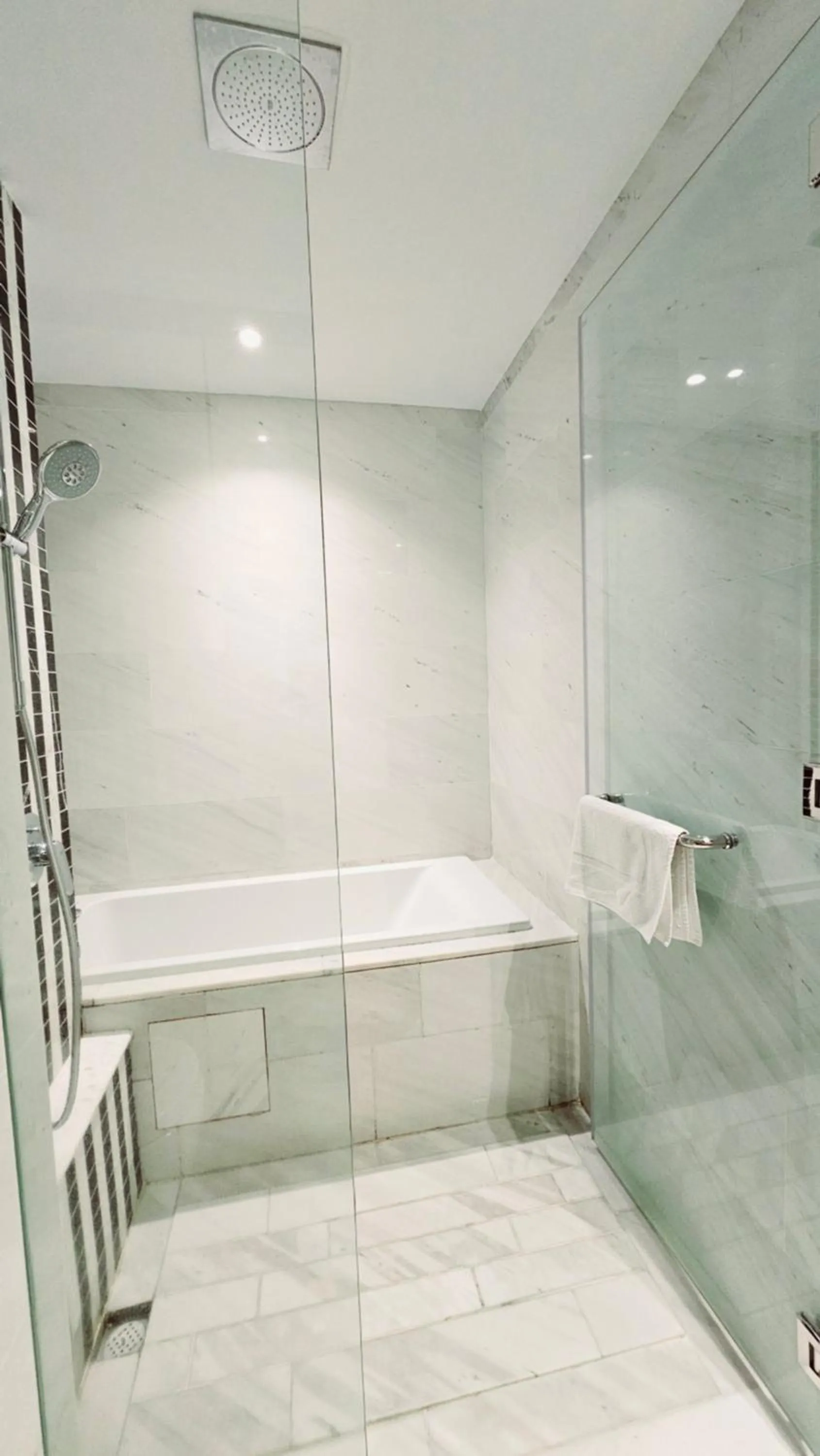 Bathroom, Bed in Crystal Service Suite At Eaton KLCC