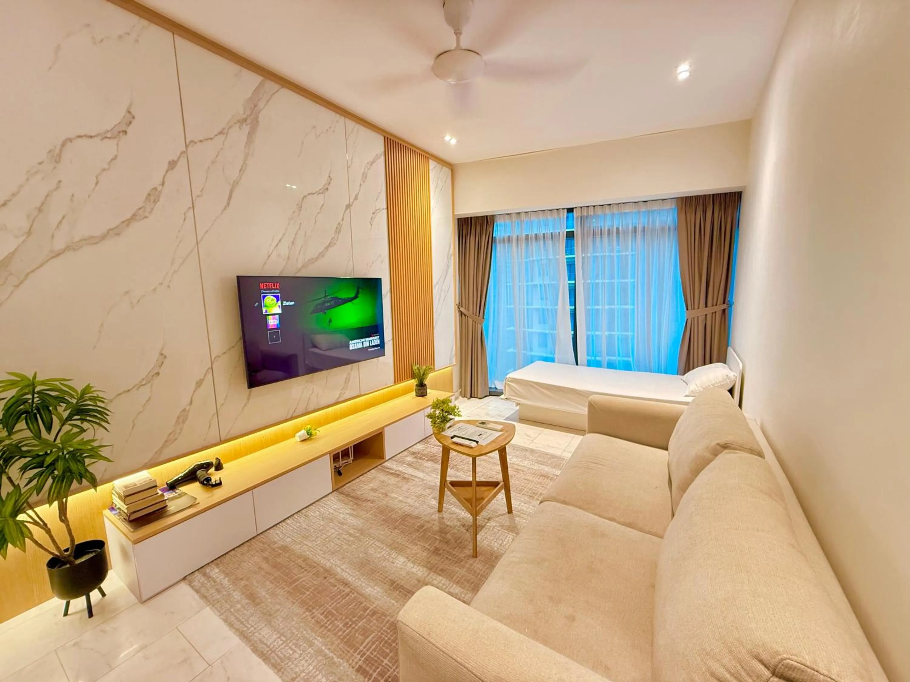 Communal lounge/ TV room in Crystal Service Suite At Eaton KLCC