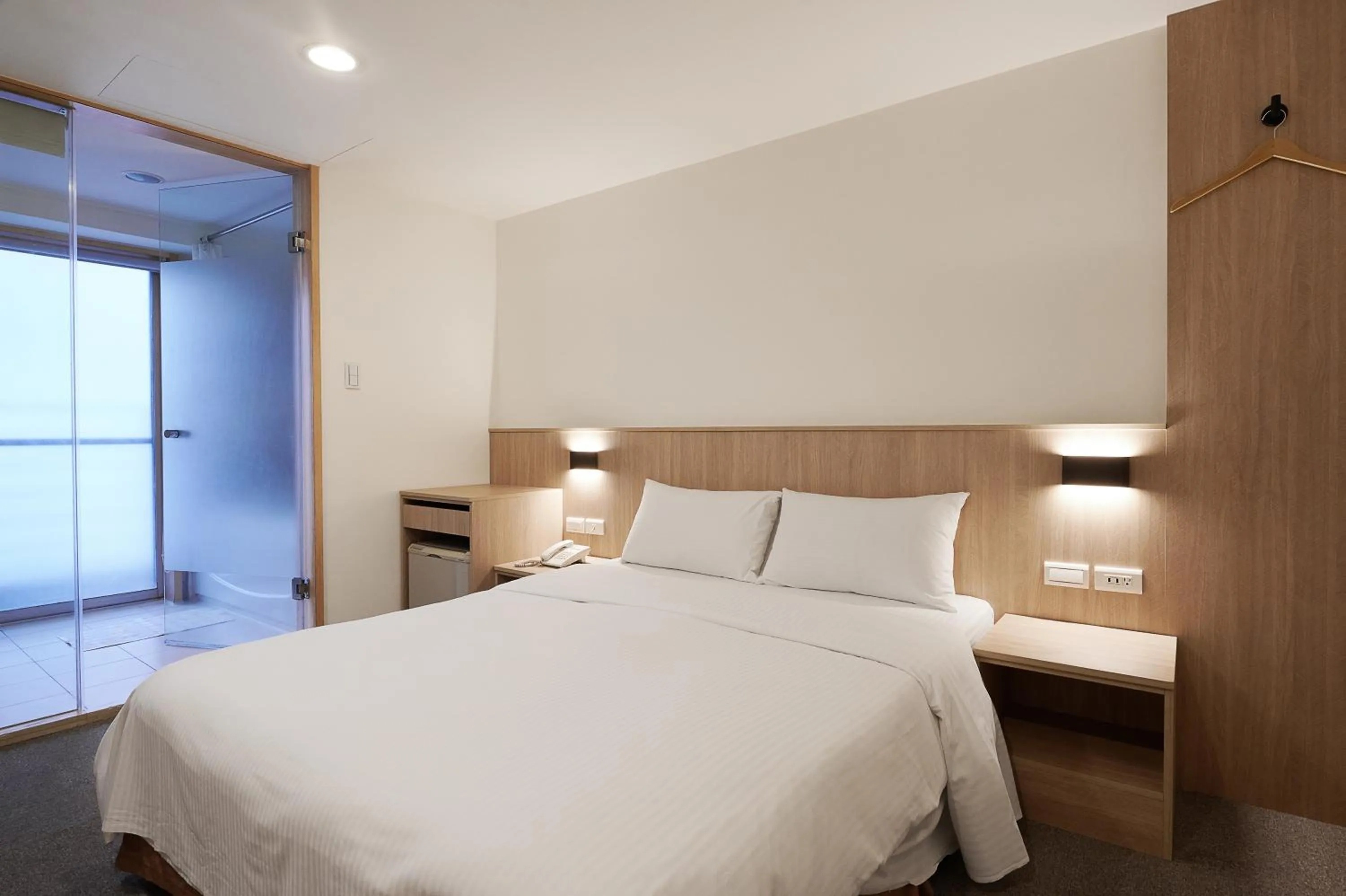 Photo of the whole room, Bed in Nei Jiang Hotel