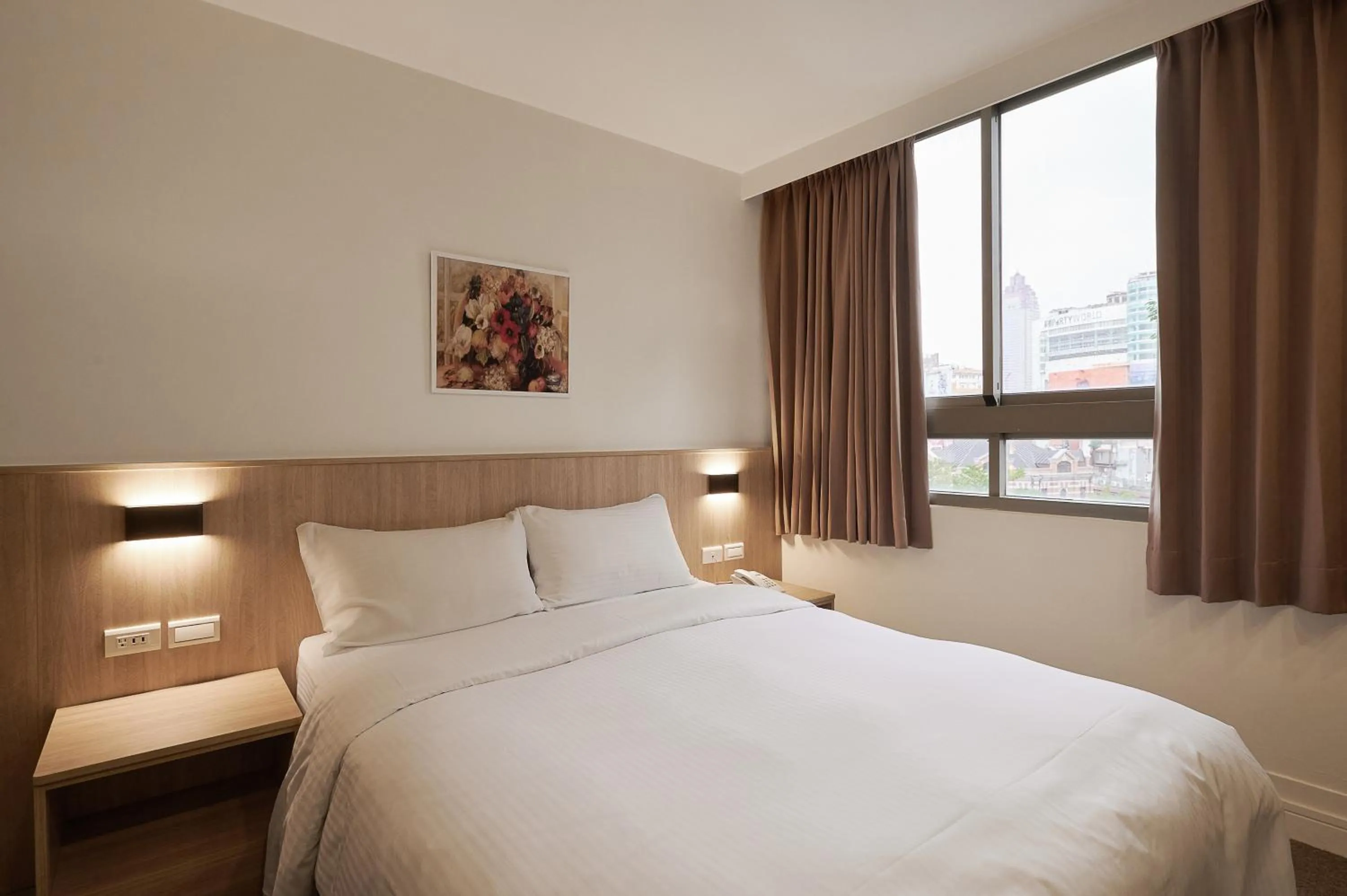 Photo of the whole room, Bed in Nei Jiang Hotel