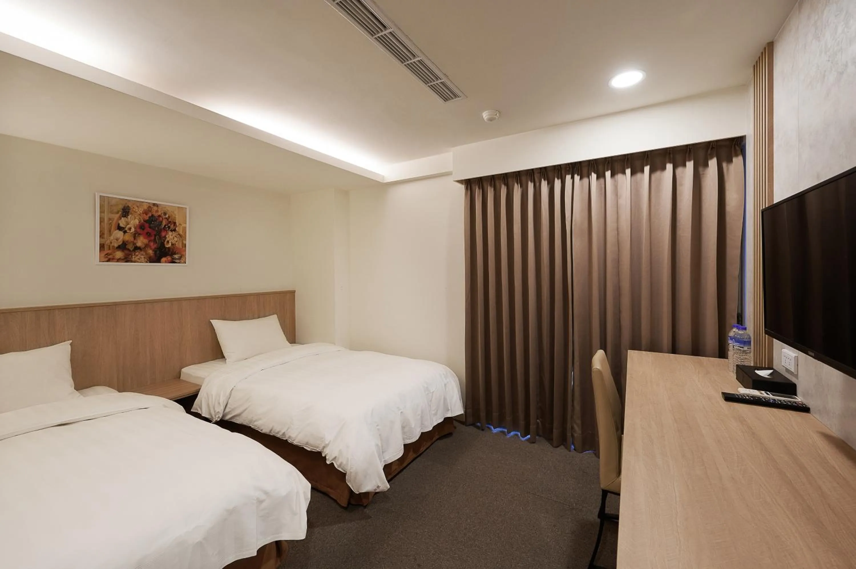 Photo of the whole room, Bed in Nei Jiang Hotel