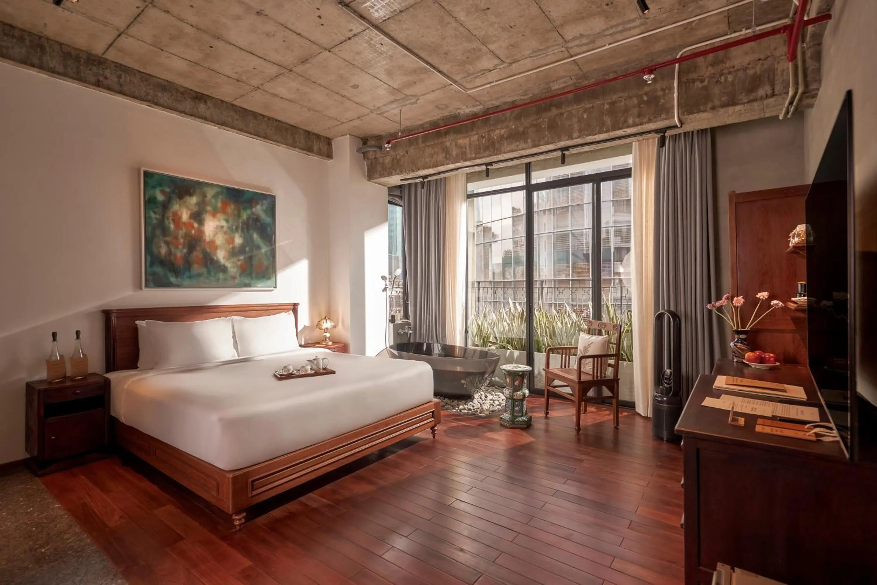 Photo of the whole room, Bed in Anima Saigon Boutique - Vietnamese Contemporary Art Hotel