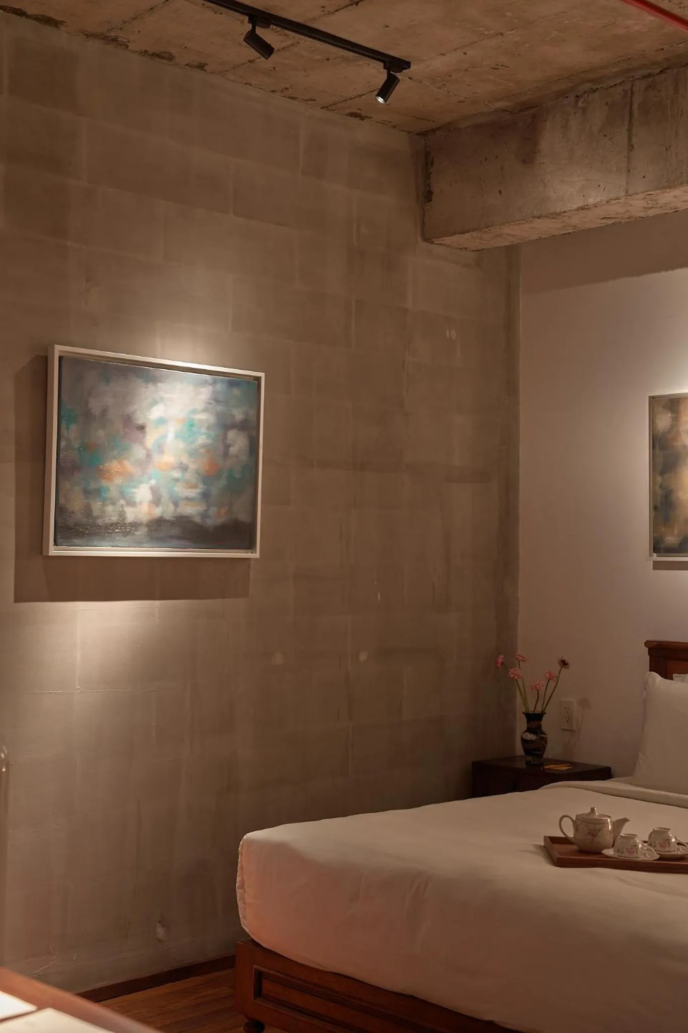 Living room, Bed in Anima Saigon Boutique - Vietnamese Contemporary Art Hotel