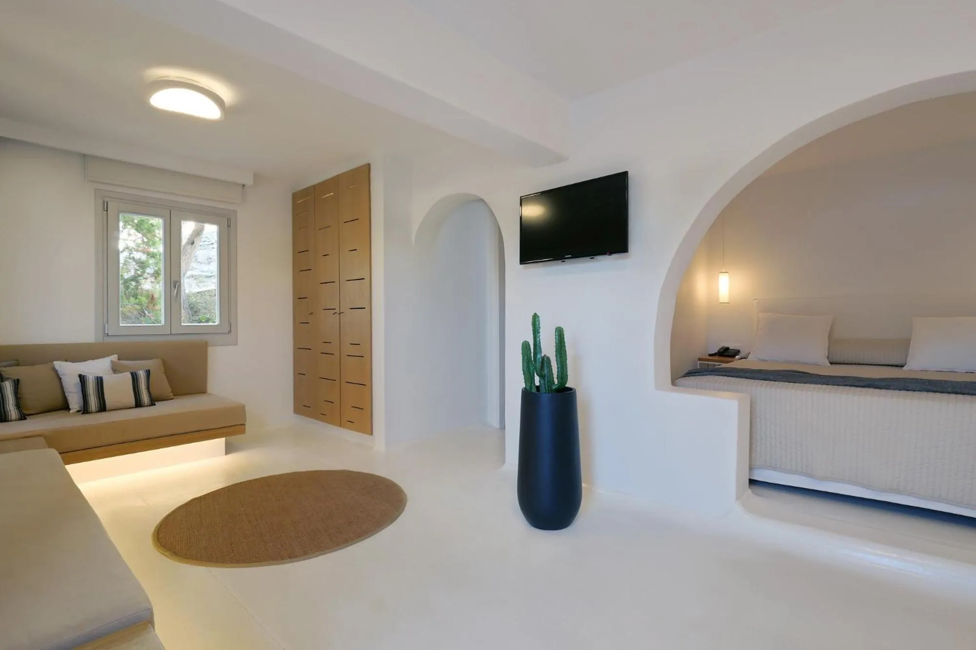 Bed in Andronikos Hotel