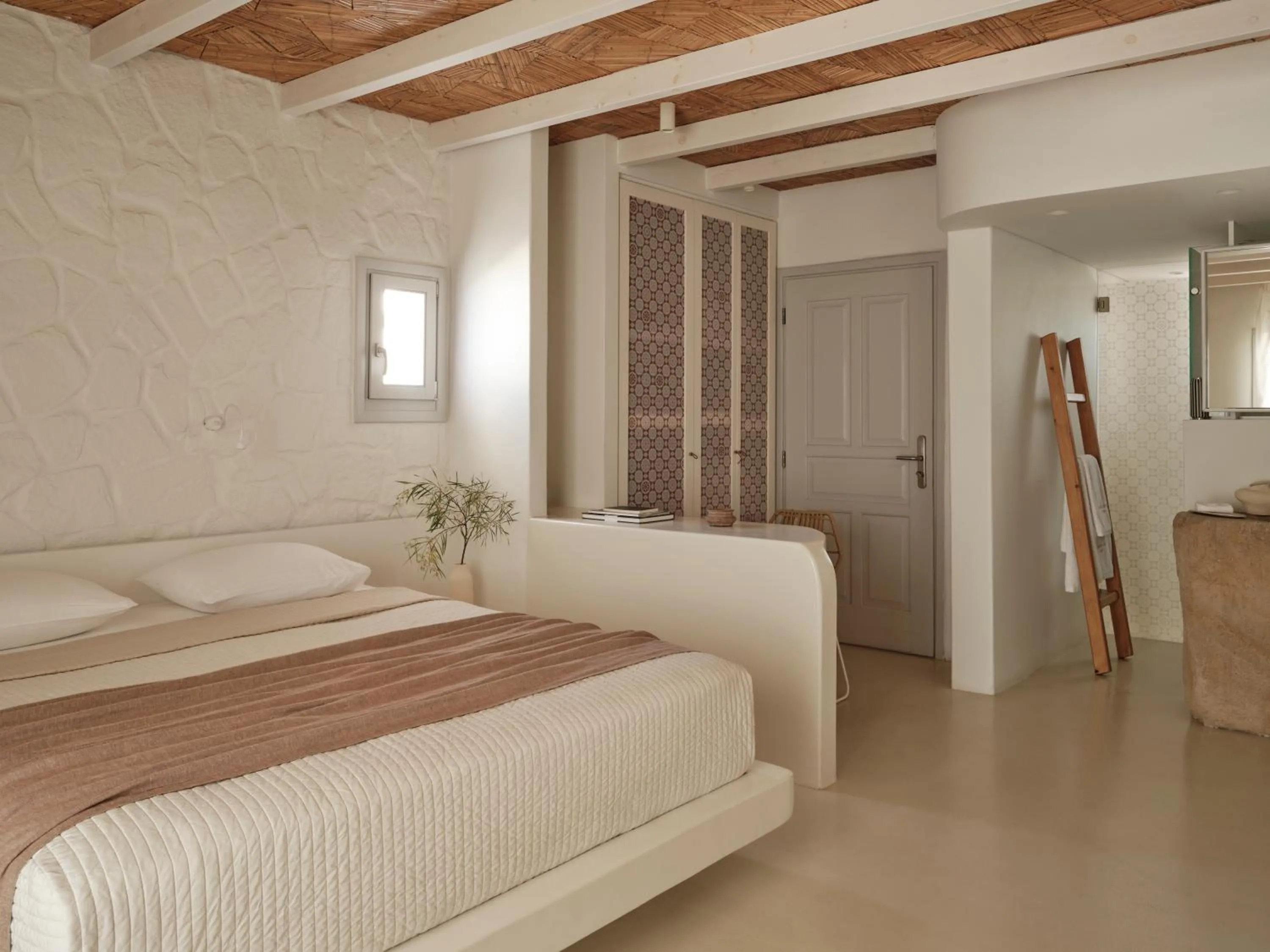 Bed in Andronikos Hotel