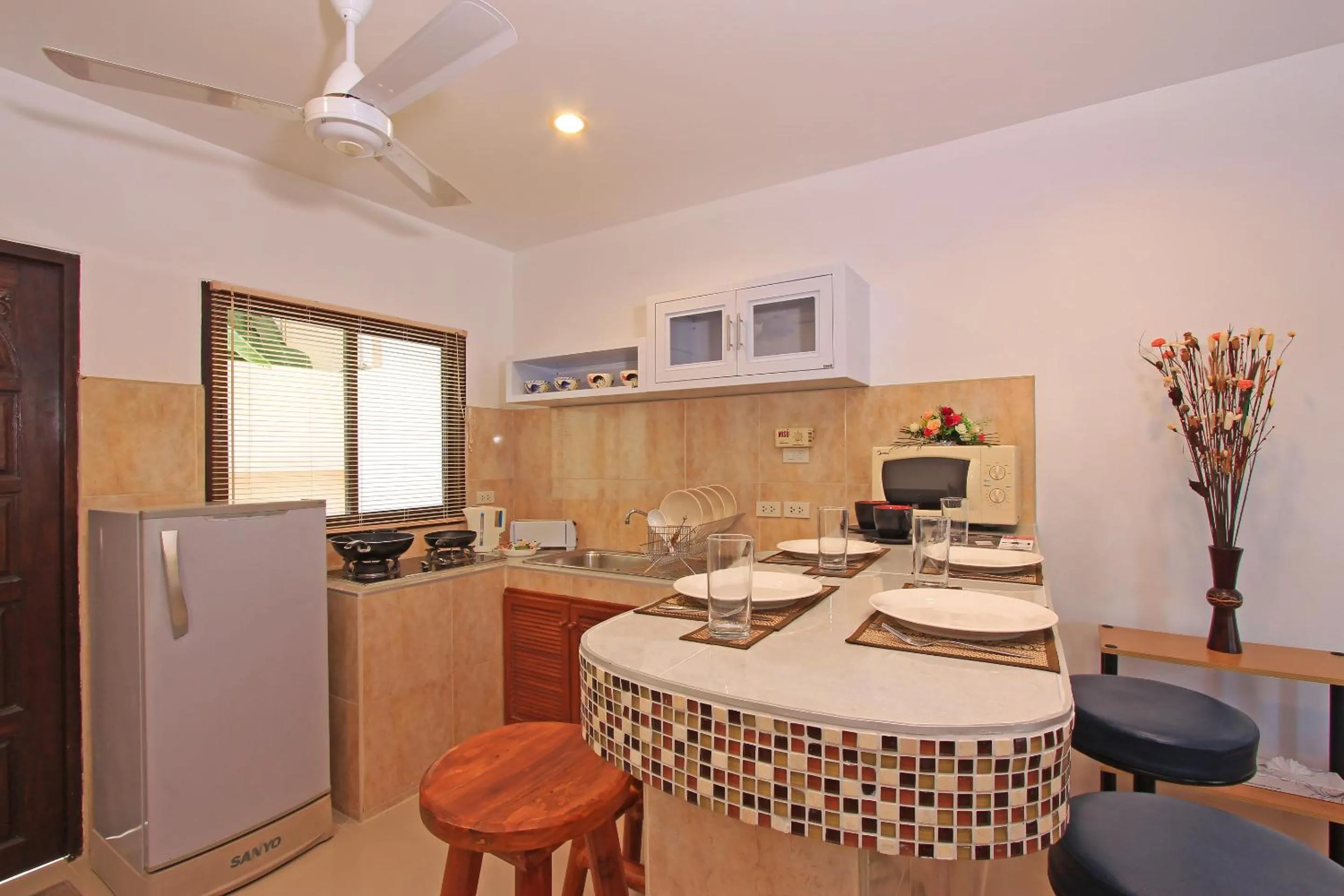 Kitchen or kitchenette in Soleil D'asie Residence