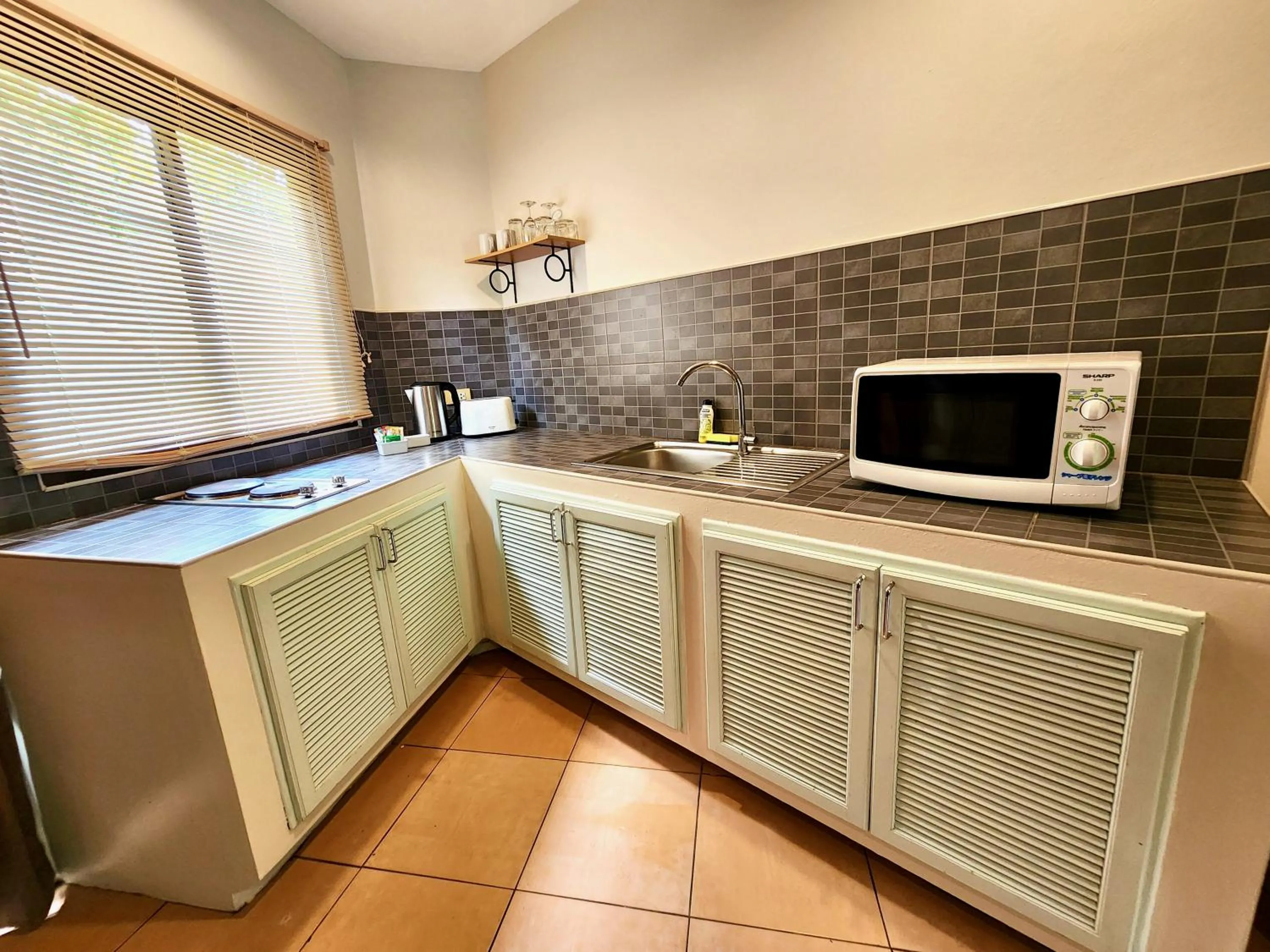 Kitchen or kitchenette in Soleil D'asie Residence