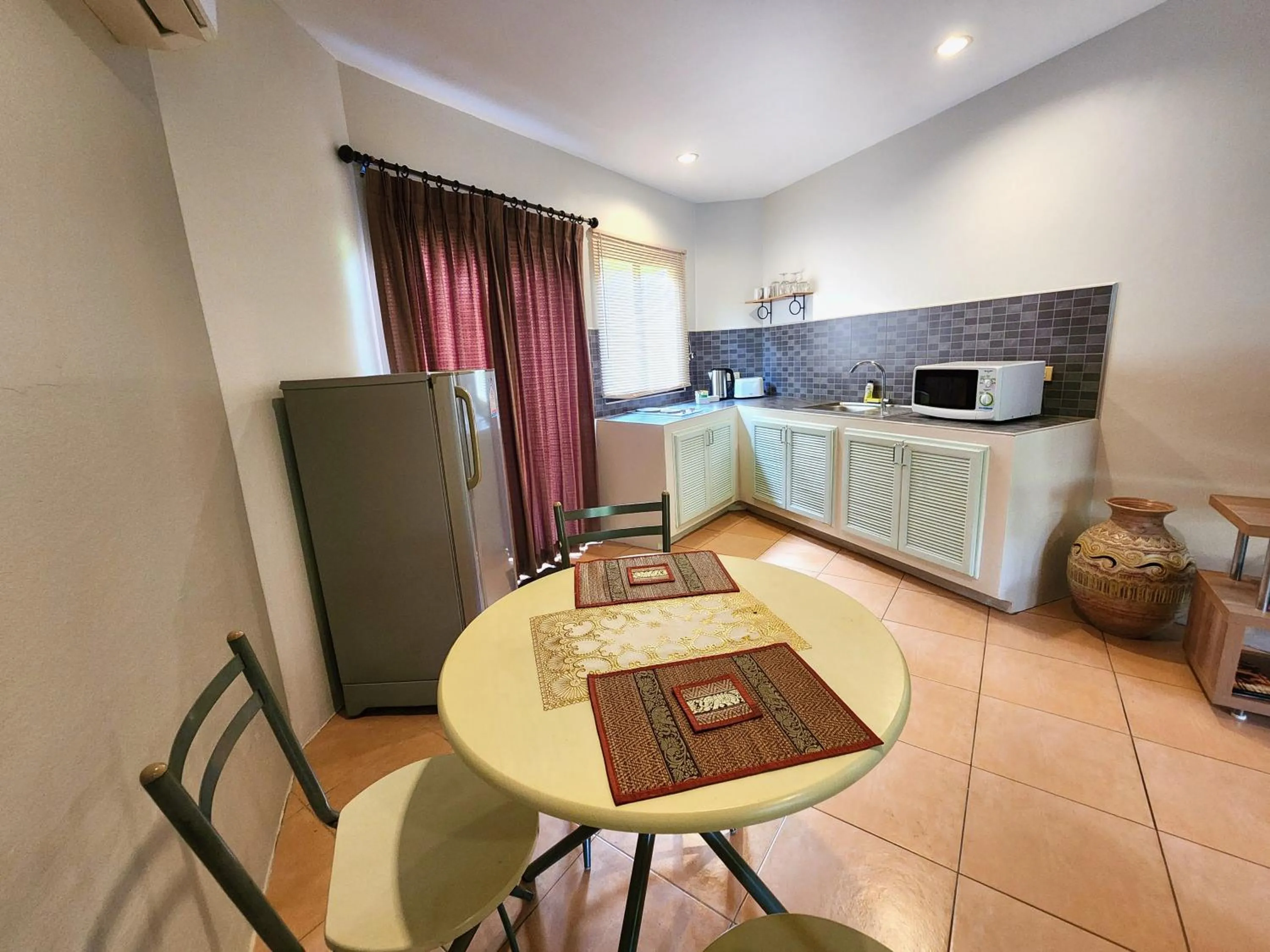Kitchen or kitchenette in Soleil D'asie Residence