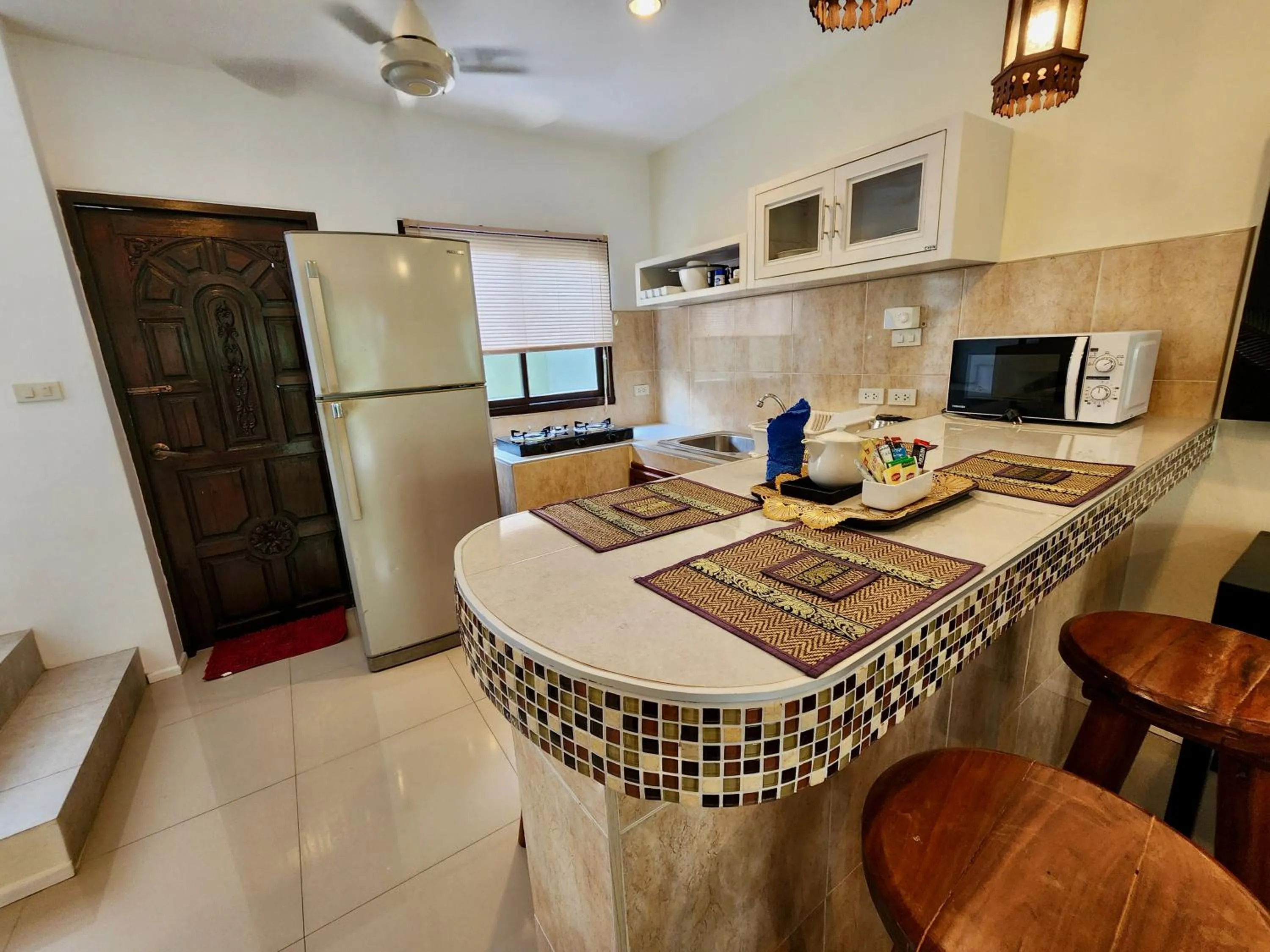 Kitchen or kitchenette in Soleil D'asie Residence