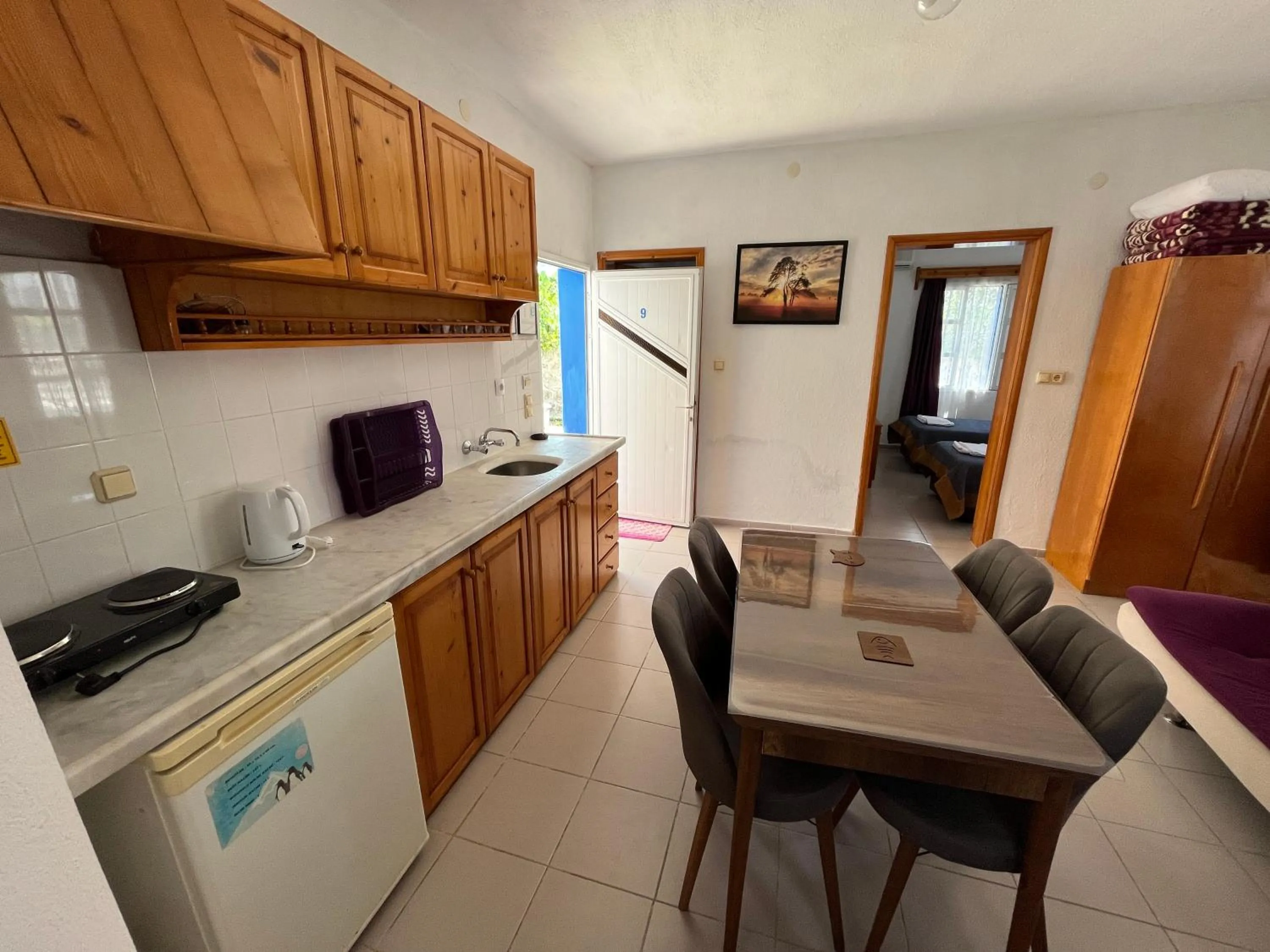 Kitchen or kitchenette in Ege Apartments