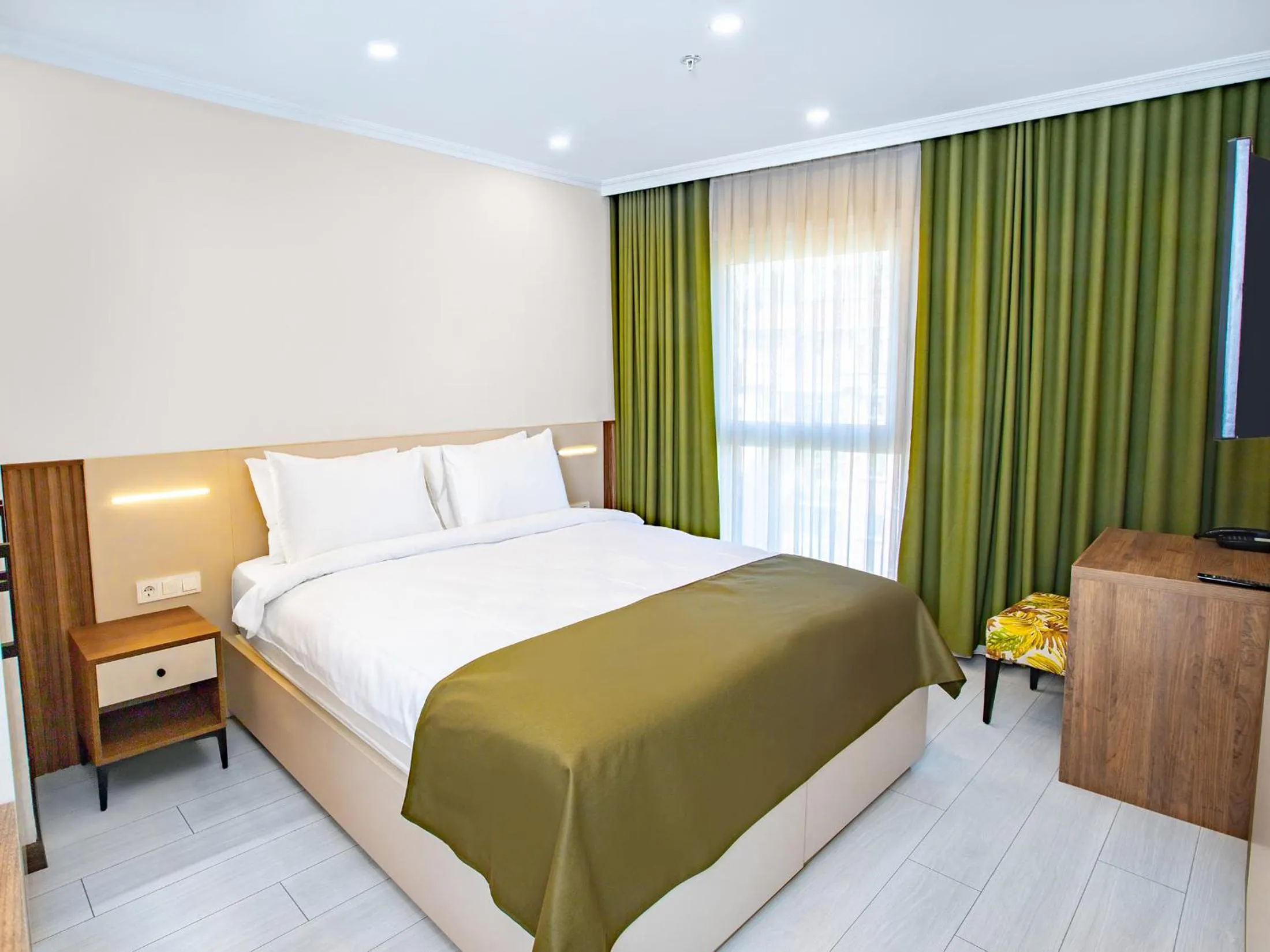 Bed in Quinnova Hotel