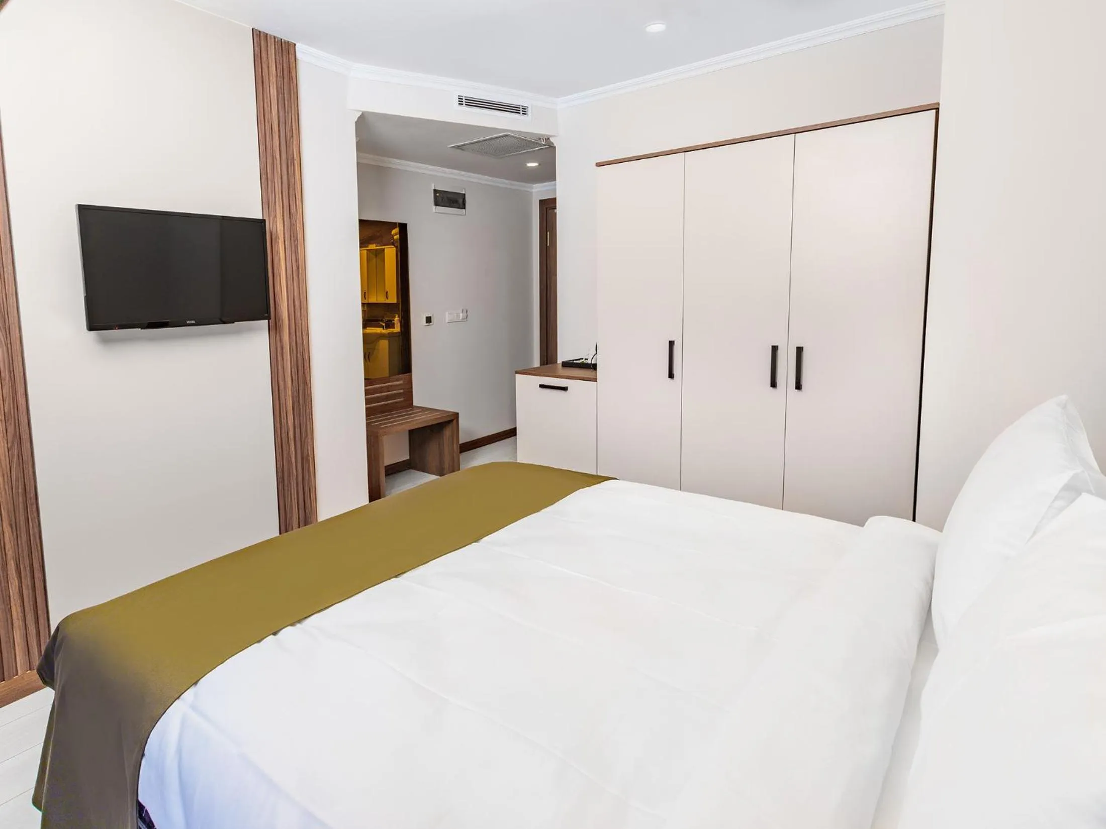 Bed in Quinnova Hotel