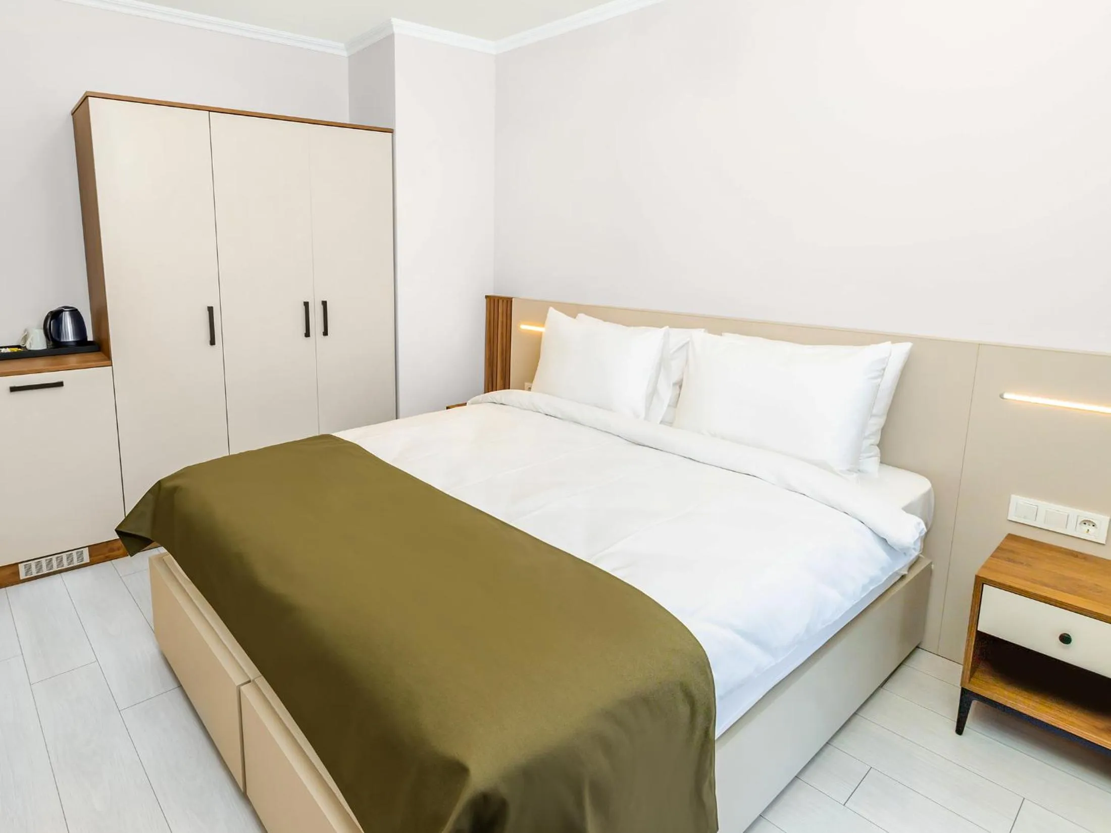 Bed in Quinnova Hotel