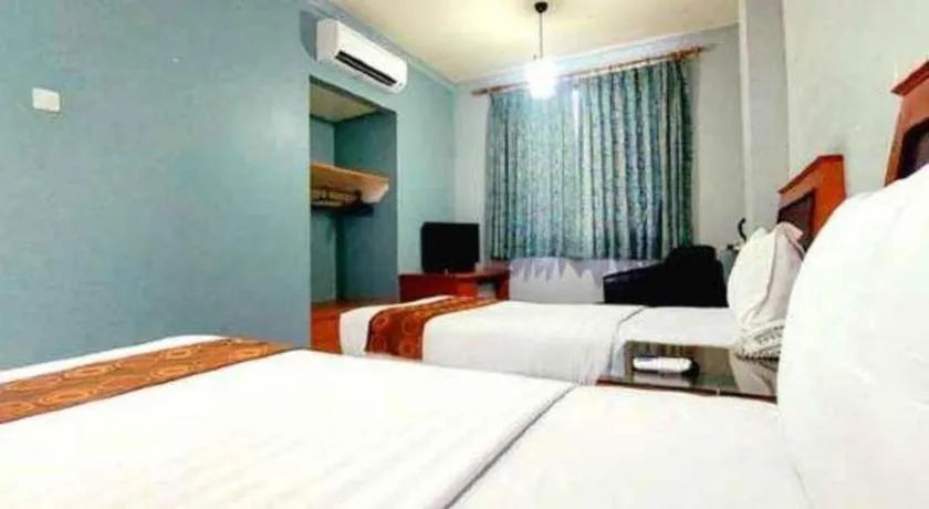 Bed in Rama Garden Hotel