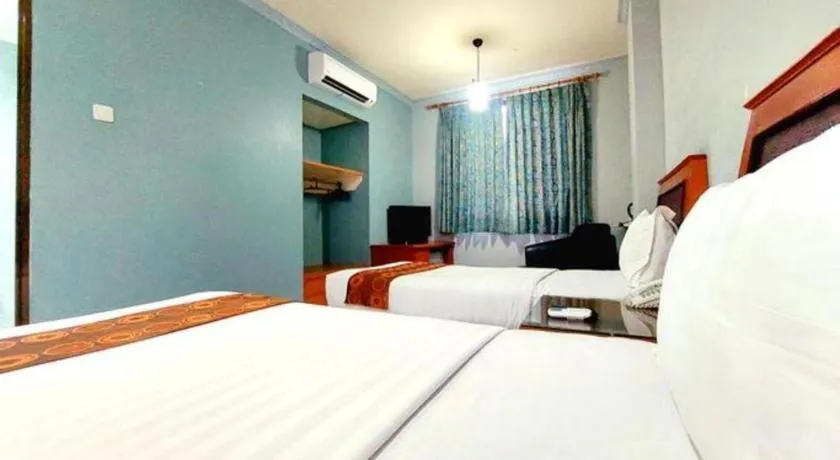 Bed in Rama Garden Hotel