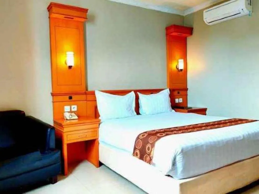Bed in Rama Garden Hotel