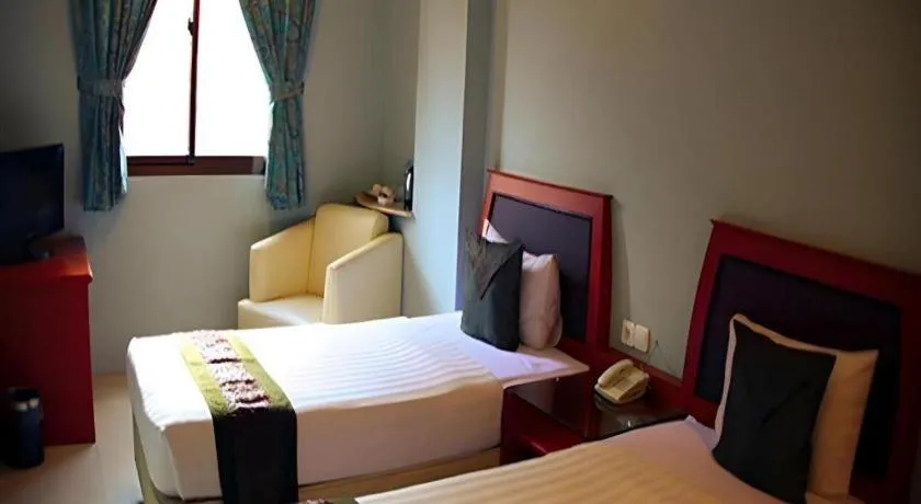 Bed in Rama Garden Hotel